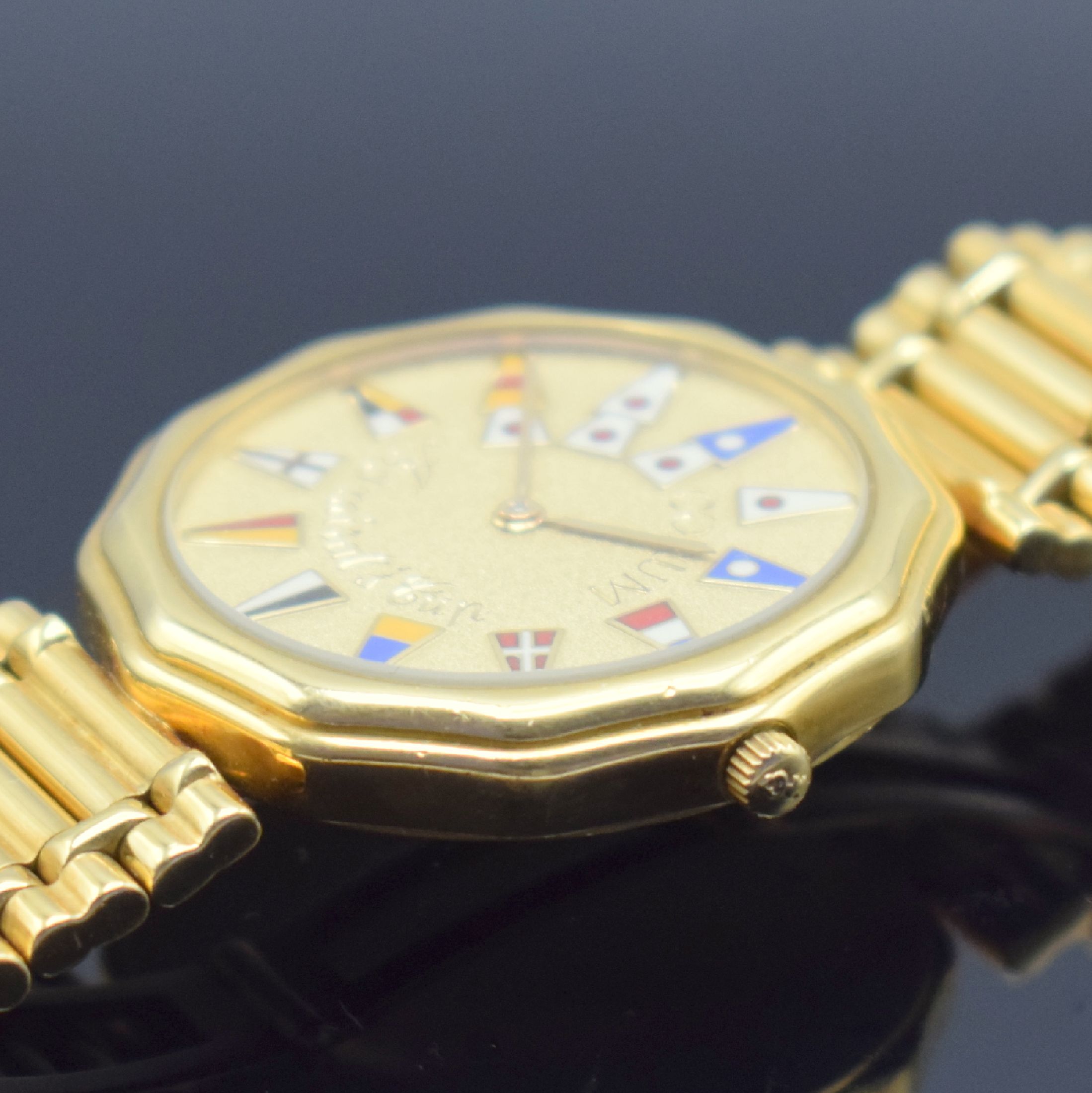 Detail d: CORUM Herrenarmbanduhr Serie Admiral´s Cup in GG 750/000 Referenz 64.810.56 V-66, Schweiz um 1985, GG 750/000 Gliederband m. dopp. Faltschl., Boden ...