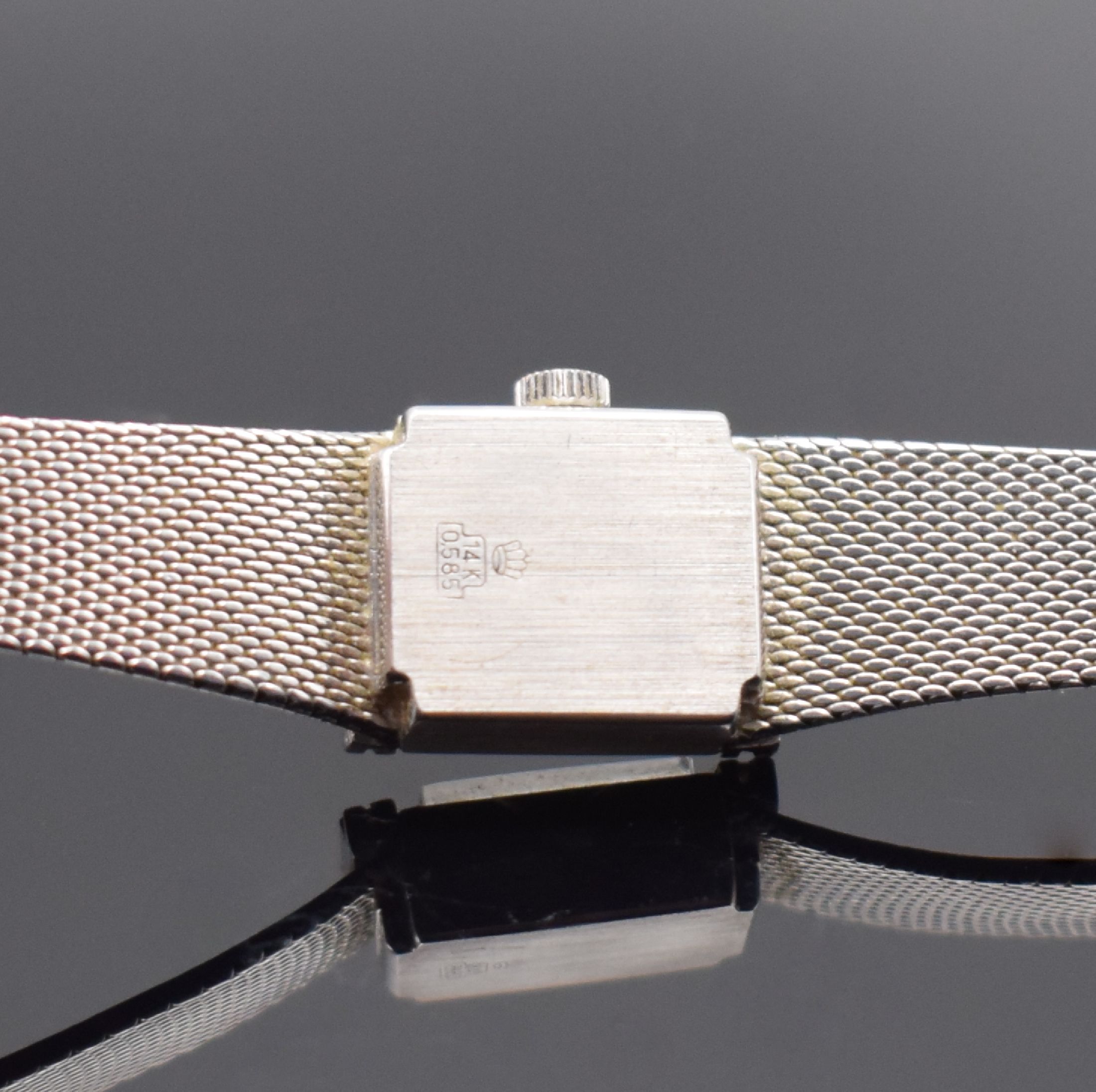 Detail c: IMPERIA Damenarmbanduhr in WG 585/000, Schweiz verk. lt. beil. Garantieschein 10/1974, Handaufzug, Boden aufgedr., Anstöße m. Diamanten bes., silb. ...