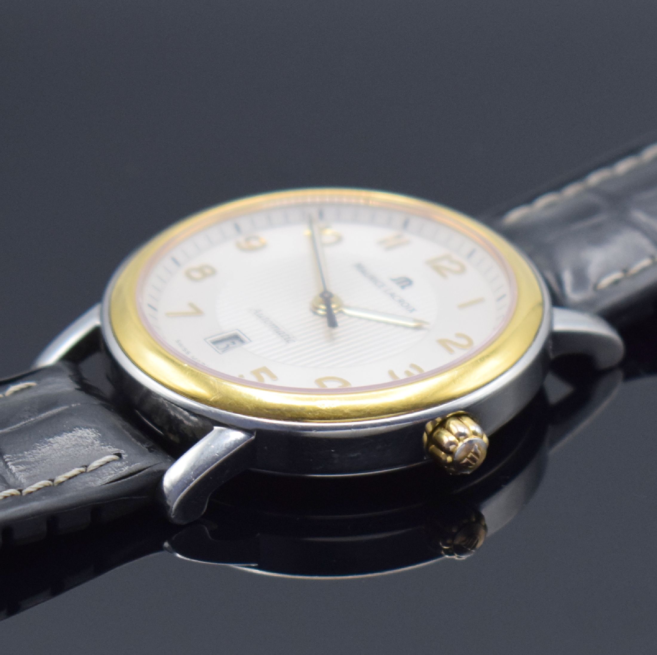 Detail b: MAURICE LACROIX Herrenarmbanduhr in Stahl/Gold Referenz LC6018, Schweiz um 2000, Automatik, gedr. Stahlgeh. m. gold. Lünette, neutr. Band, silb. ...