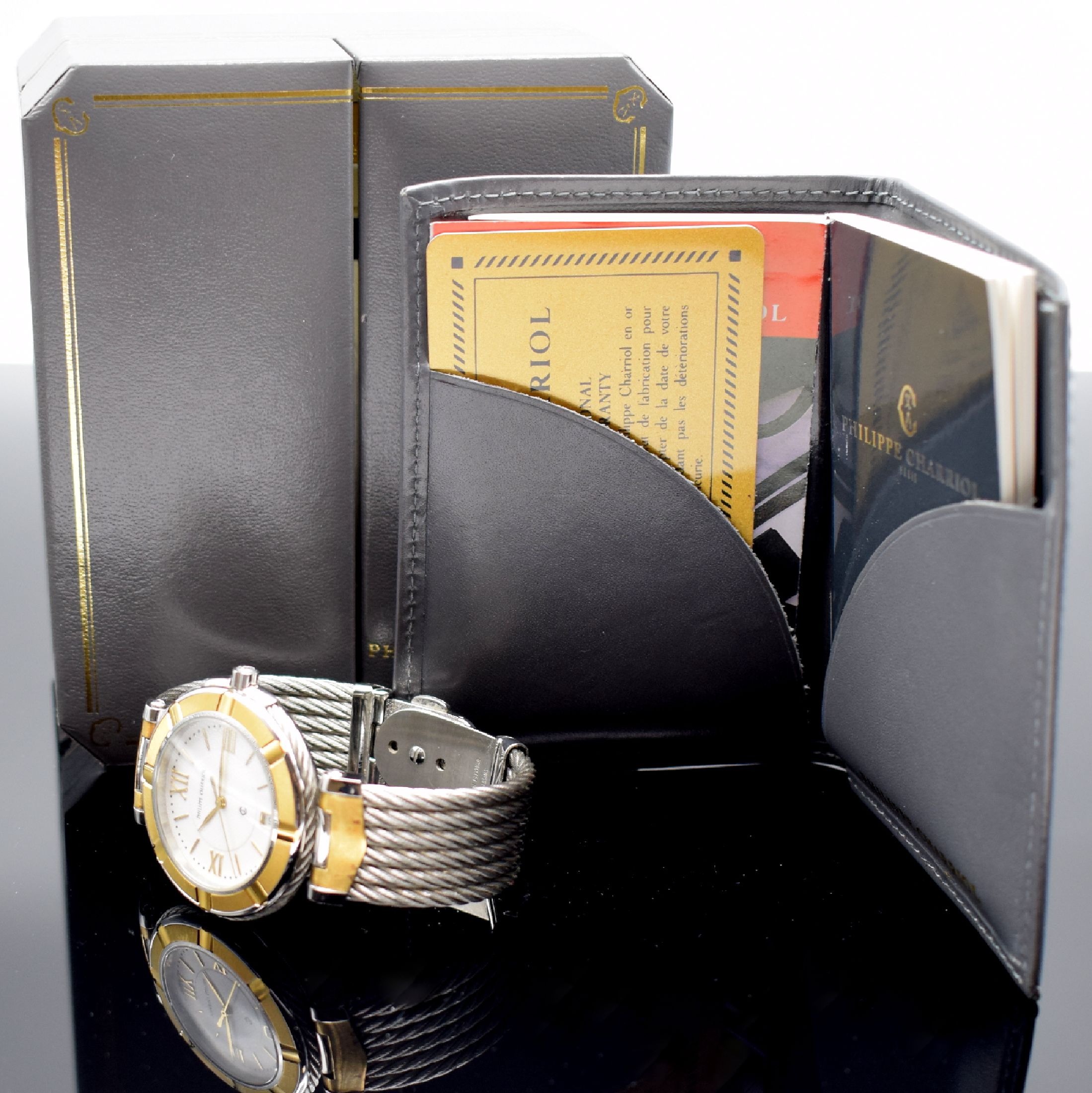 Detail d: PHILIPPE CHARRIOL Herrenarmbanduhr, Schweiz um 1997, quarz, z. T. verg. Edelstahlgeh. inkl. Stahlband, Boden aufgedr., weißes Zifferbl. mit aufges. ...