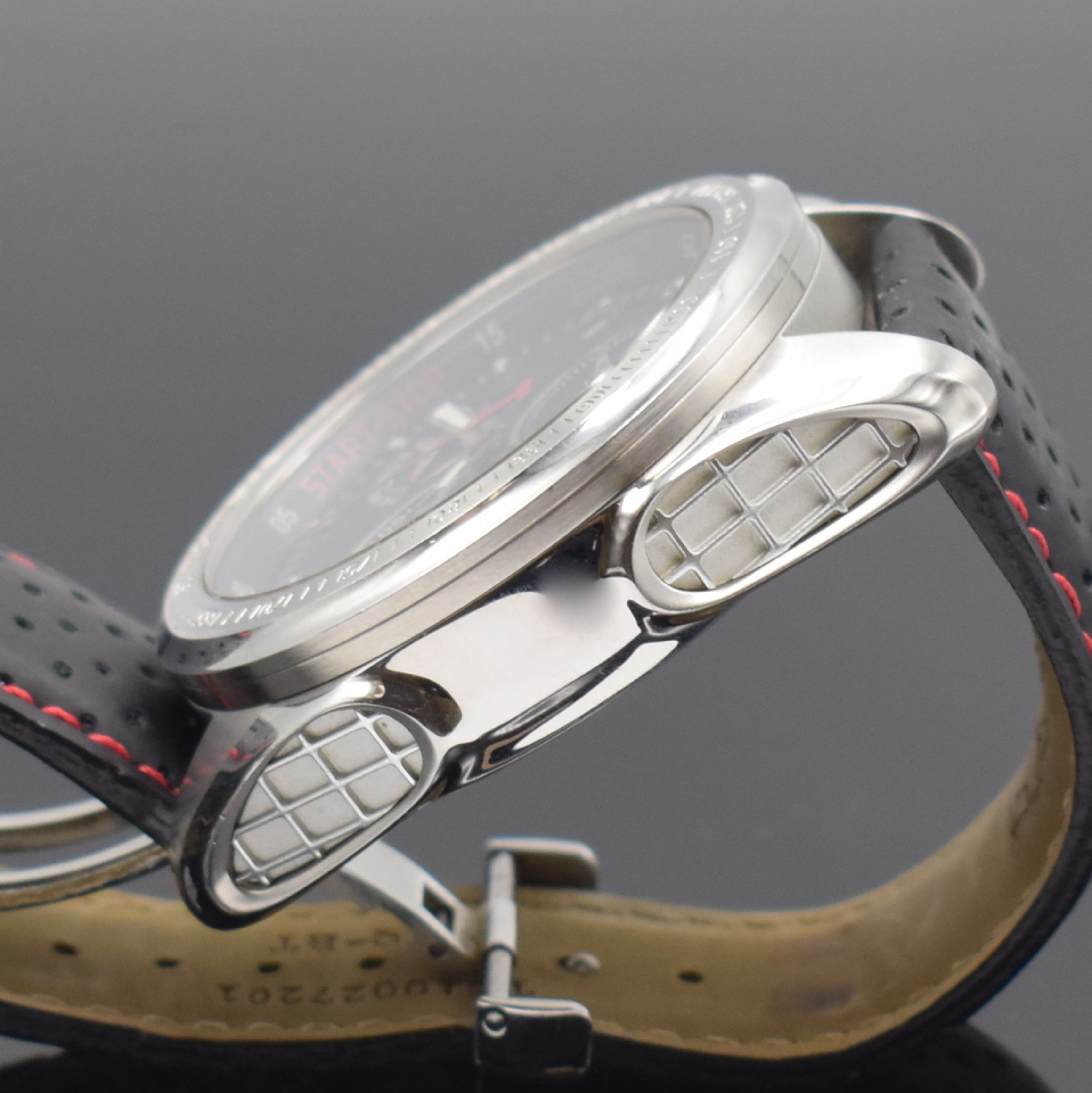 Detail e: TISSOT T-Sport Racing Herrenarmbanduhr mit Chronograph, Schweiz um 2010, quarz, großes Edelstahlgeh., Boden aufgedr., orig. Lederband m. orig. ...