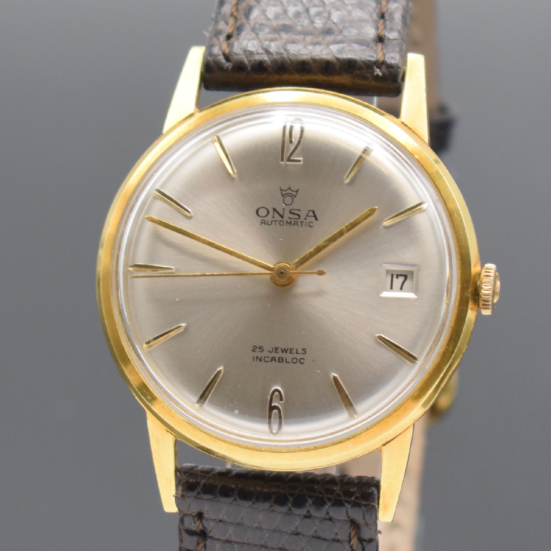 Detail a: ONSA in GG 750/000 und RENO im vergoldeten Gehäuse, 2 Herrenarmbanduhren, Schweiz und Deutschland um 1960, beide Automatik, Böden aufgedr., 1) ONSA ...