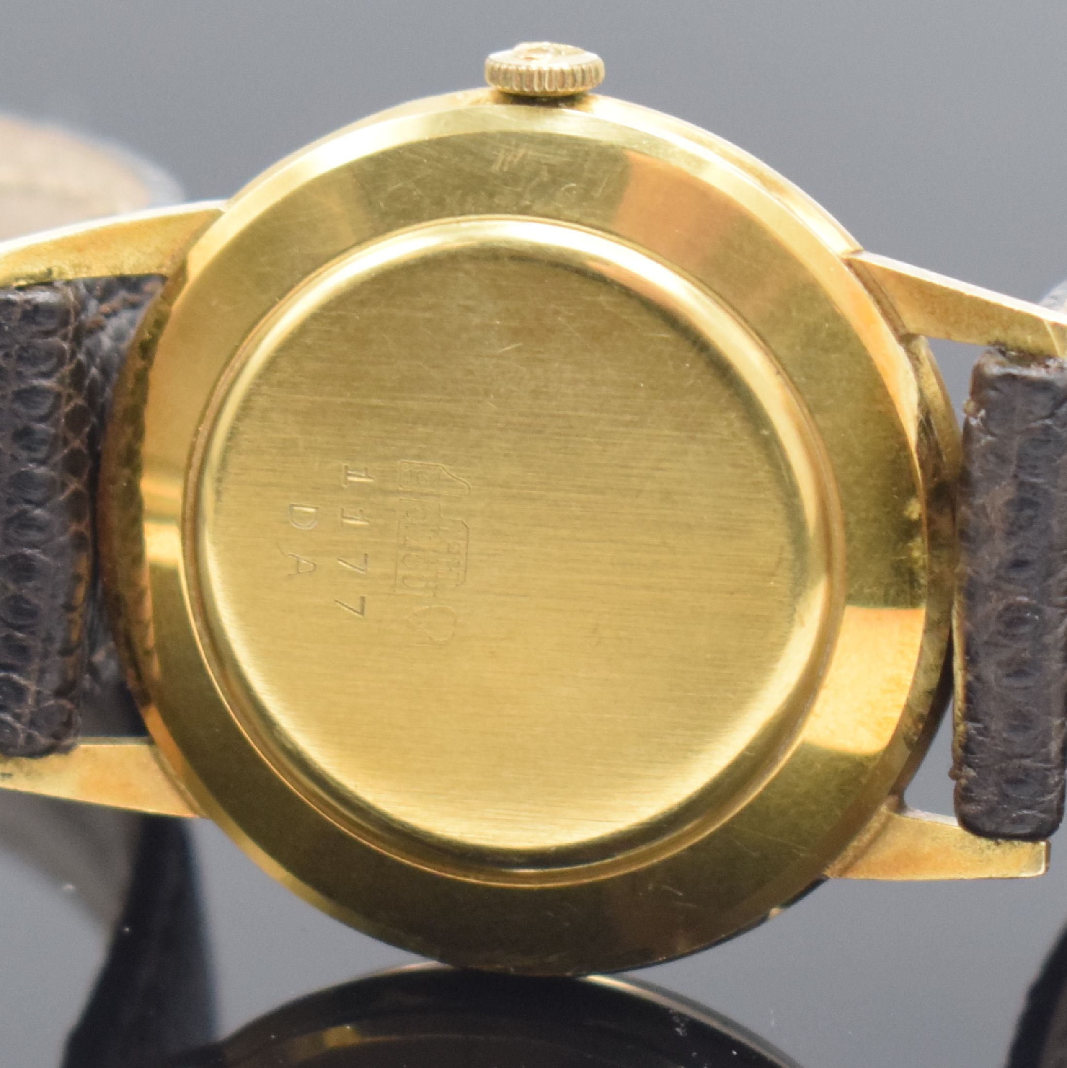 Detail b: ONSA in GG 750/000 und RENO im vergoldeten Gehäuse, 2 Herrenarmbanduhren, Schweiz und Deutschland um 1960, beide Automatik, Böden aufgedr., 1) ONSA ...