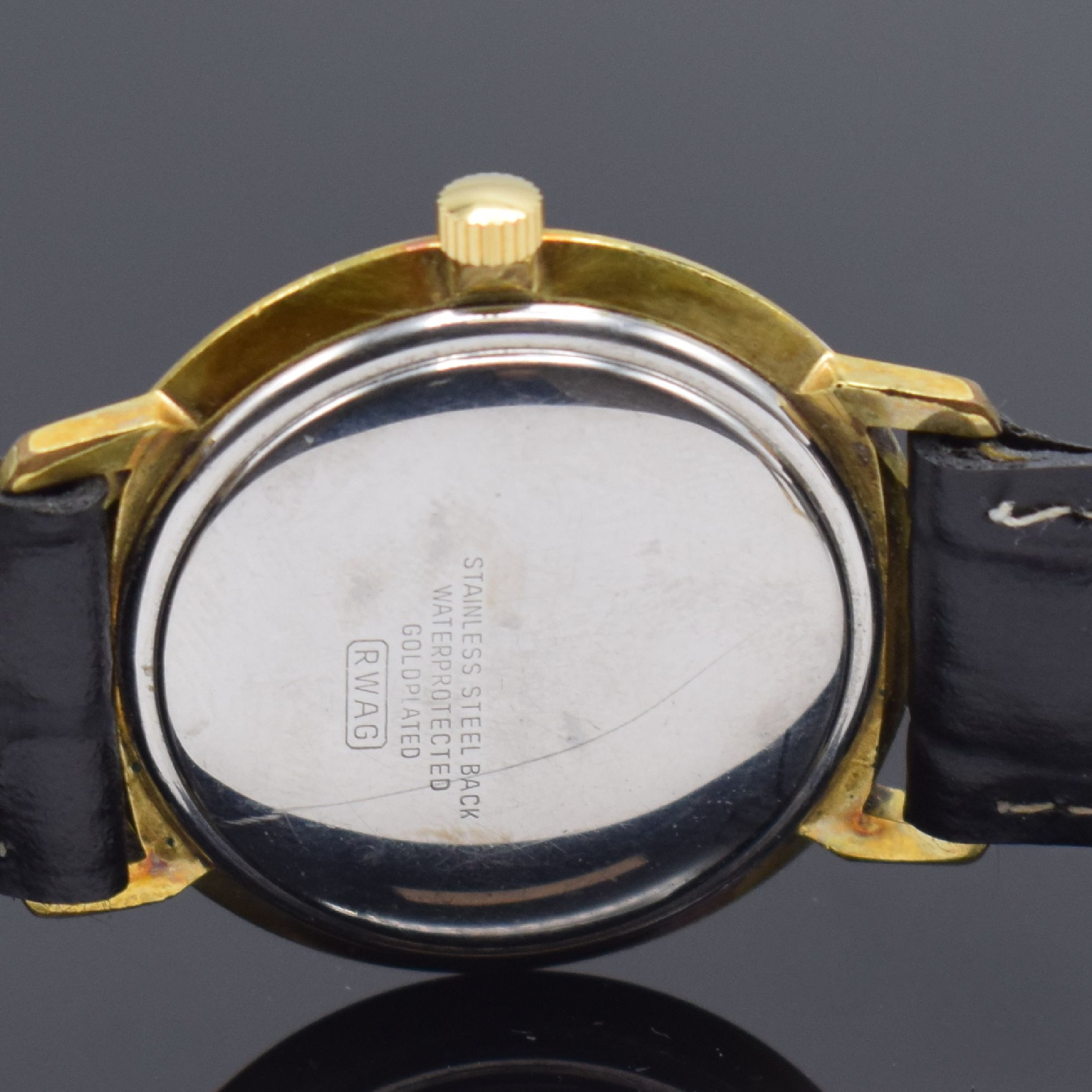 Detail f: ONSA in GG 750/000 und RENO im vergoldeten Gehäuse, 2 Herrenarmbanduhren, Schweiz und Deutschland um 1960, beide Automatik, Böden aufgedr., 1) ONSA ...
