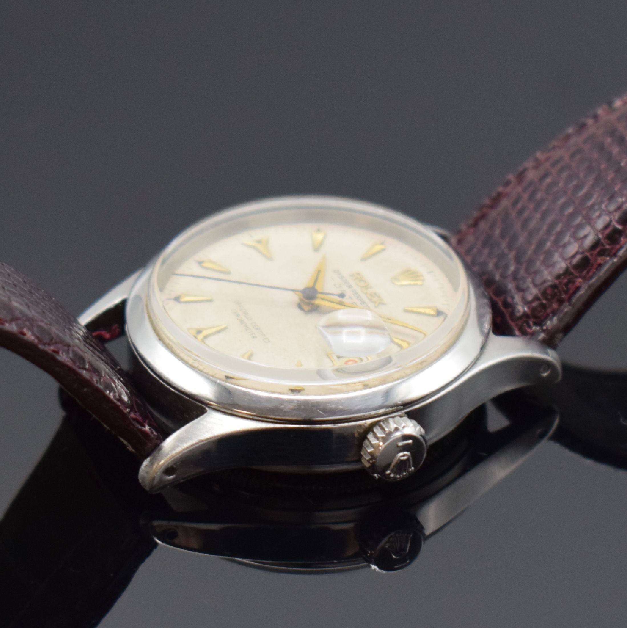 Detail b: ROLEX Oyster Perpetual Date Herrenarmbanduhr in Stahl Referenz 6518, Schweiz IV. Quartal 1954 lt. Bodengravur, Automatik, verschr. Geh., silb. ...