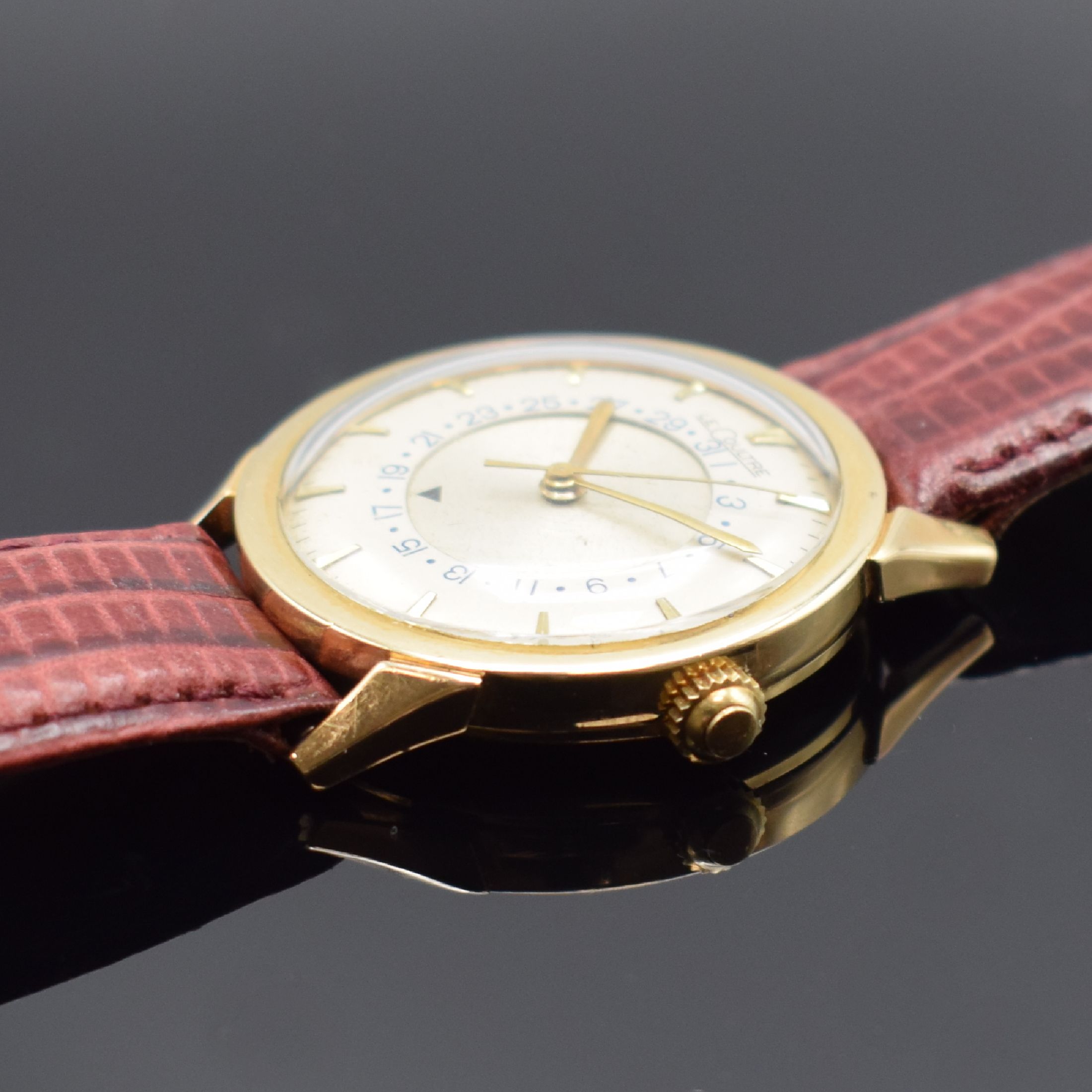 Detail b: LeCOULTRE Herrenarmbanduhr in GG 585/000, Schweiz für US-Markt, um 1950, Handaufzug, Boden aufgedr., silb. Zifferbl. m. zentraler Drehscheibe f. ...