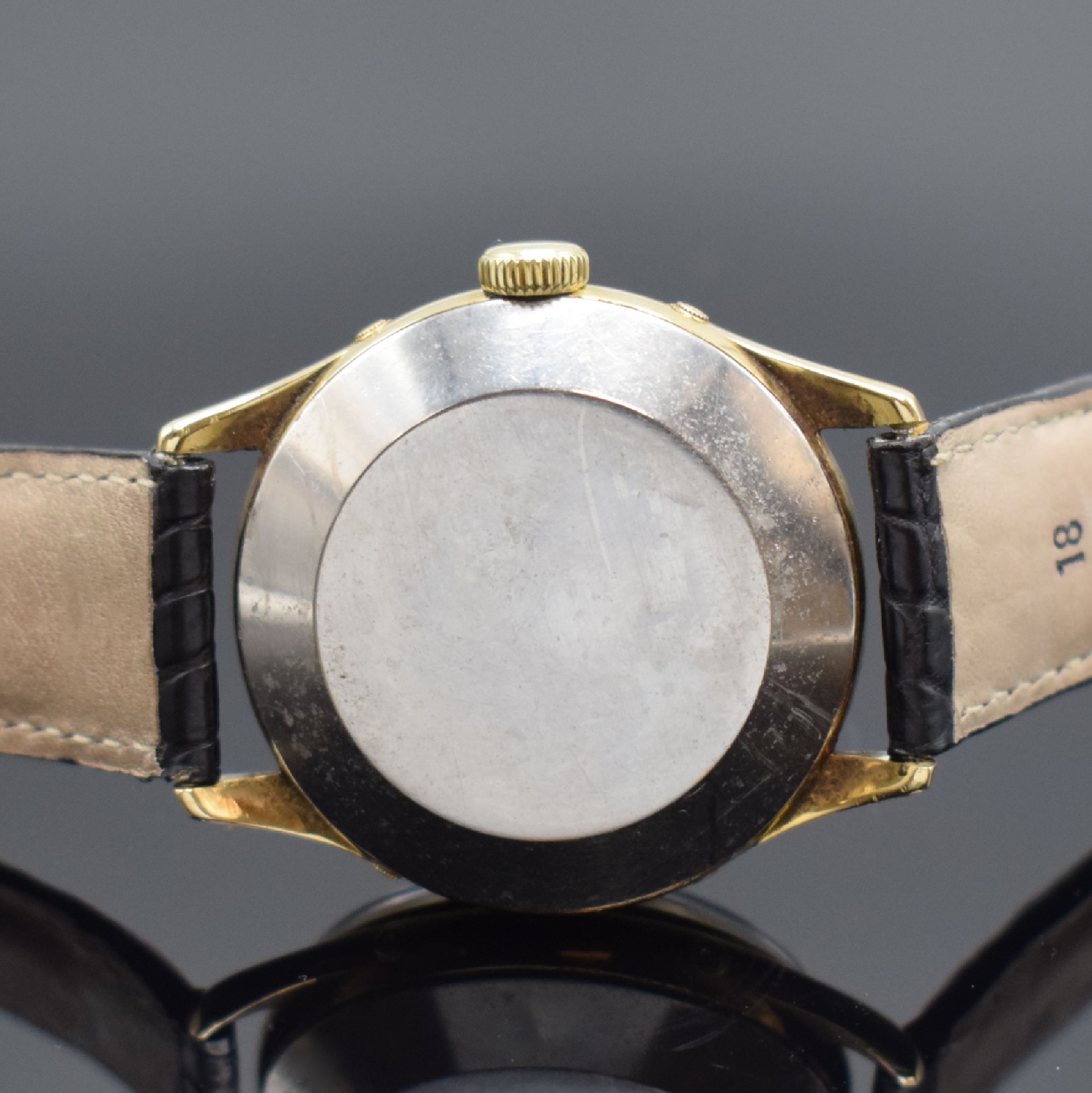 Detail d: GÜBELIN Ipso-Matic Herrenarmbanduhr mit Vollkalender, Schweiz um 1950, Automatik, verg. Geh., Boden und Lünette aufgedr., Korrekturdr. seitl. im ...