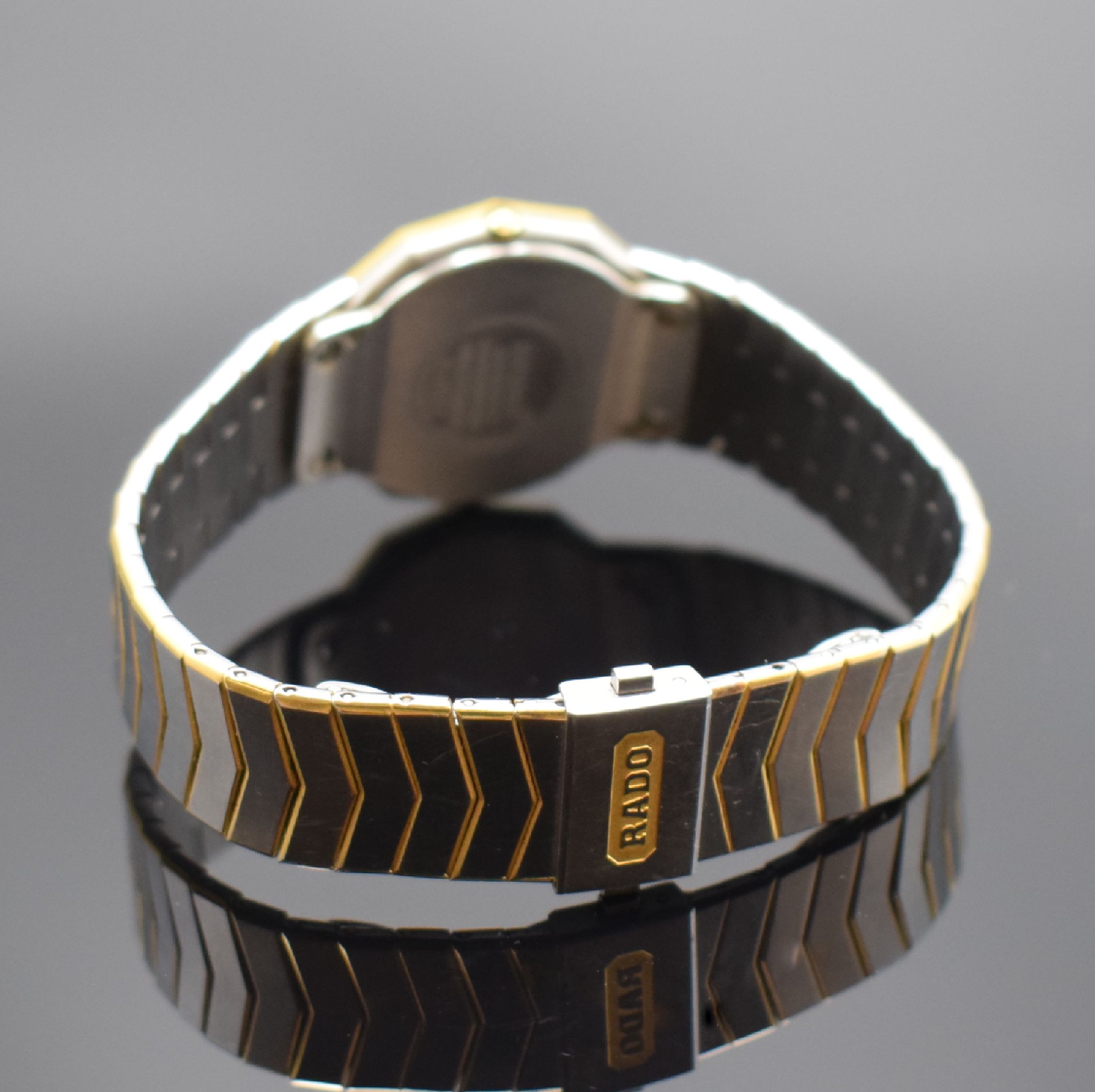Detail b: RADO Diastar Damenarmbanduhr, Schweiz um 1985, quarz, Edelstahl teils verg., Gliederband m. dopp. Faltschl., silb. Zifferbl. m. gold. Minuterie, ...