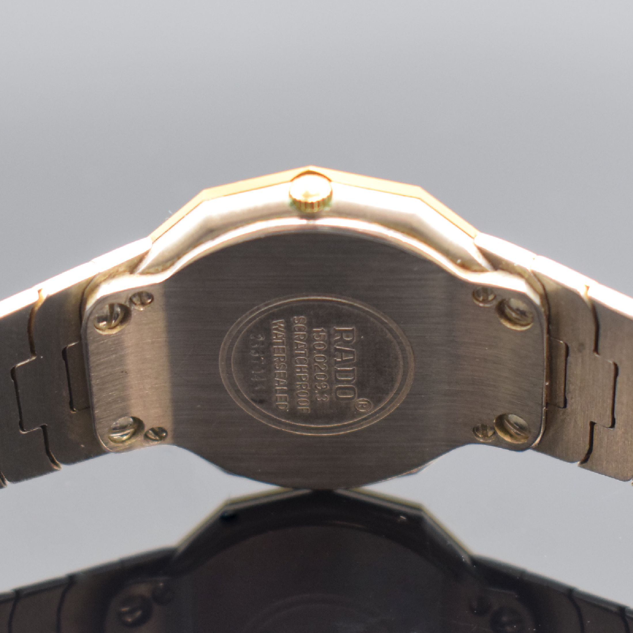 Detail d: RADO Diastar Damenarmbanduhr, Schweiz um 1985, quarz, Edelstahl teils verg., Gliederband m. dopp. Faltschl., silb. Zifferbl. m. gold. Minuterie, ...