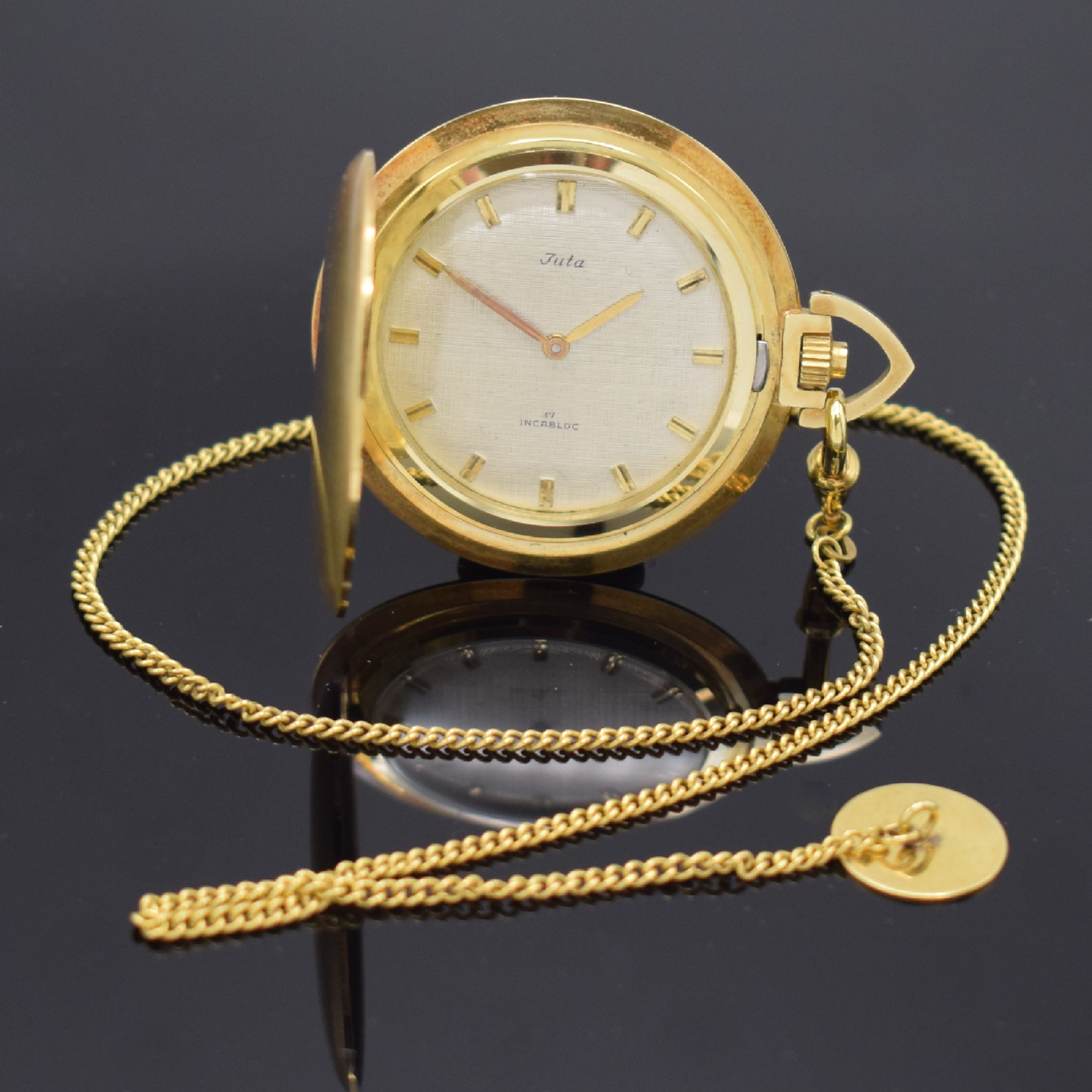 Detail b: JUTA Savonette Frackuhr in GG 585/000 an GG 585/000 Kette, Deutschland um 1965, Handaufzug, Boden aufgedr., silb. Strukturzifferbl. m. aufges. ...