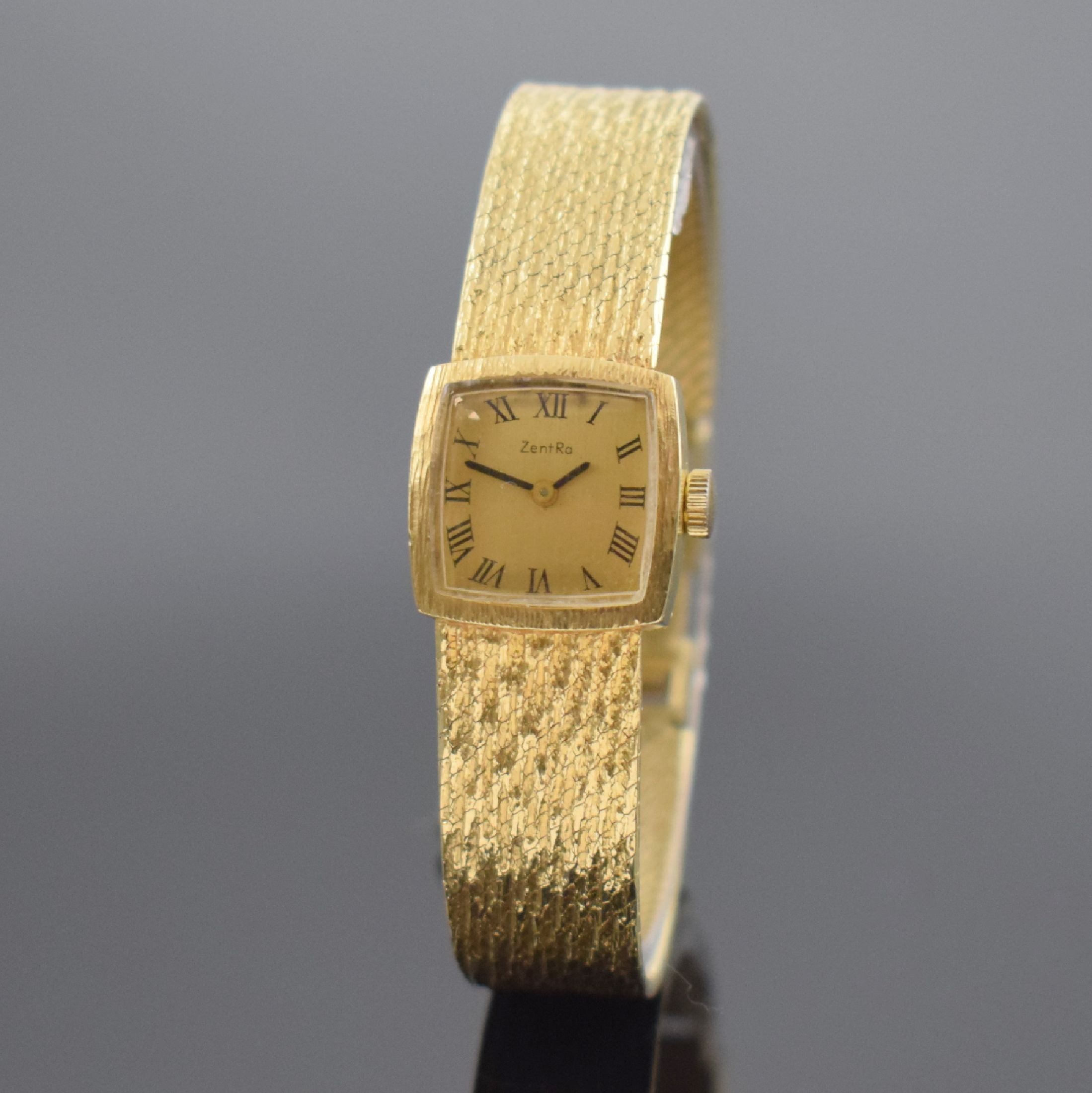 ZENTRA Damenarmbanduhr in GG 585/000, Handaufzug, Schweiz um 1970, Boden aufgedr., gold. Zifferbl. m. röm. Std. fl., Anz. v. Std. und Min., 17 St., ...