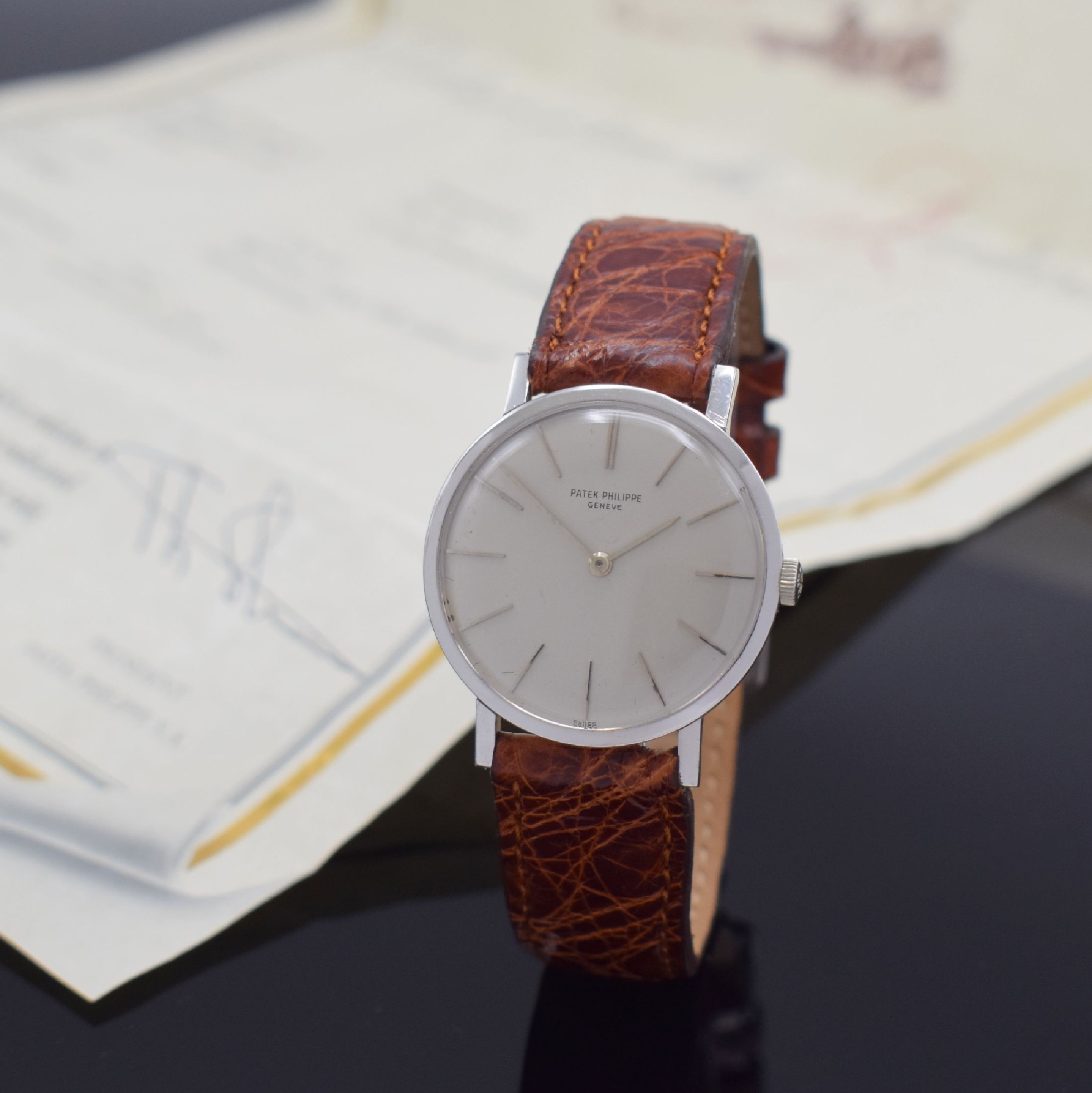 PATEK PHILIPPE Armbanduhr in WG 750/000 Referenz 3426, Schweiz 07/1962, Handaufzug, 3-teil. Gehäuse, Boden und Glasrand aufgedr., silb. Zifferbl. m. ...