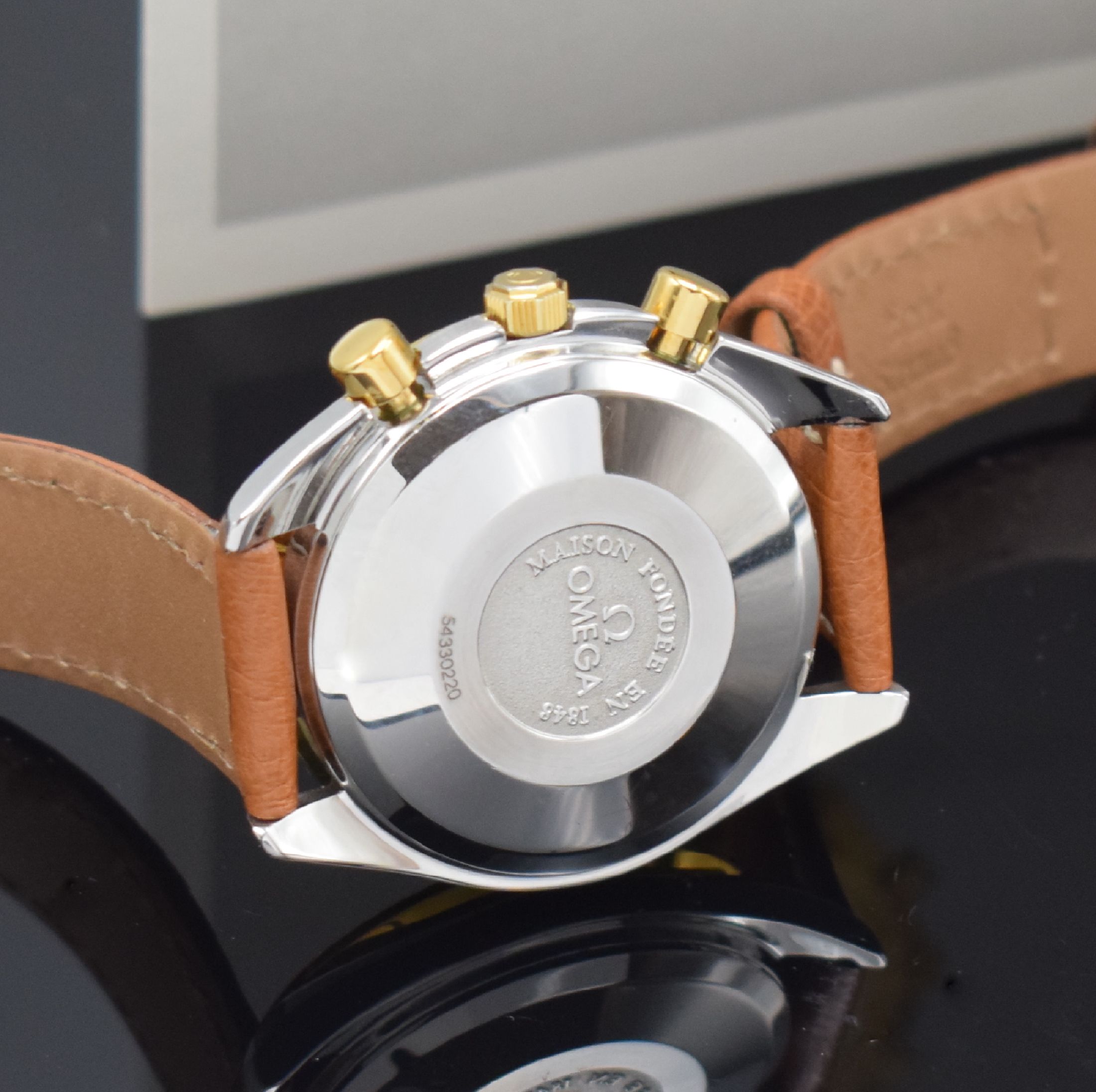 Detail e: OMEGA astronomischer Armbandchronograph Serie Speedmaster Referenz 37312060, Automatik, Vollkalenderanzeige inkl. Mondphase, Edelstahlgeh. inkl. ...