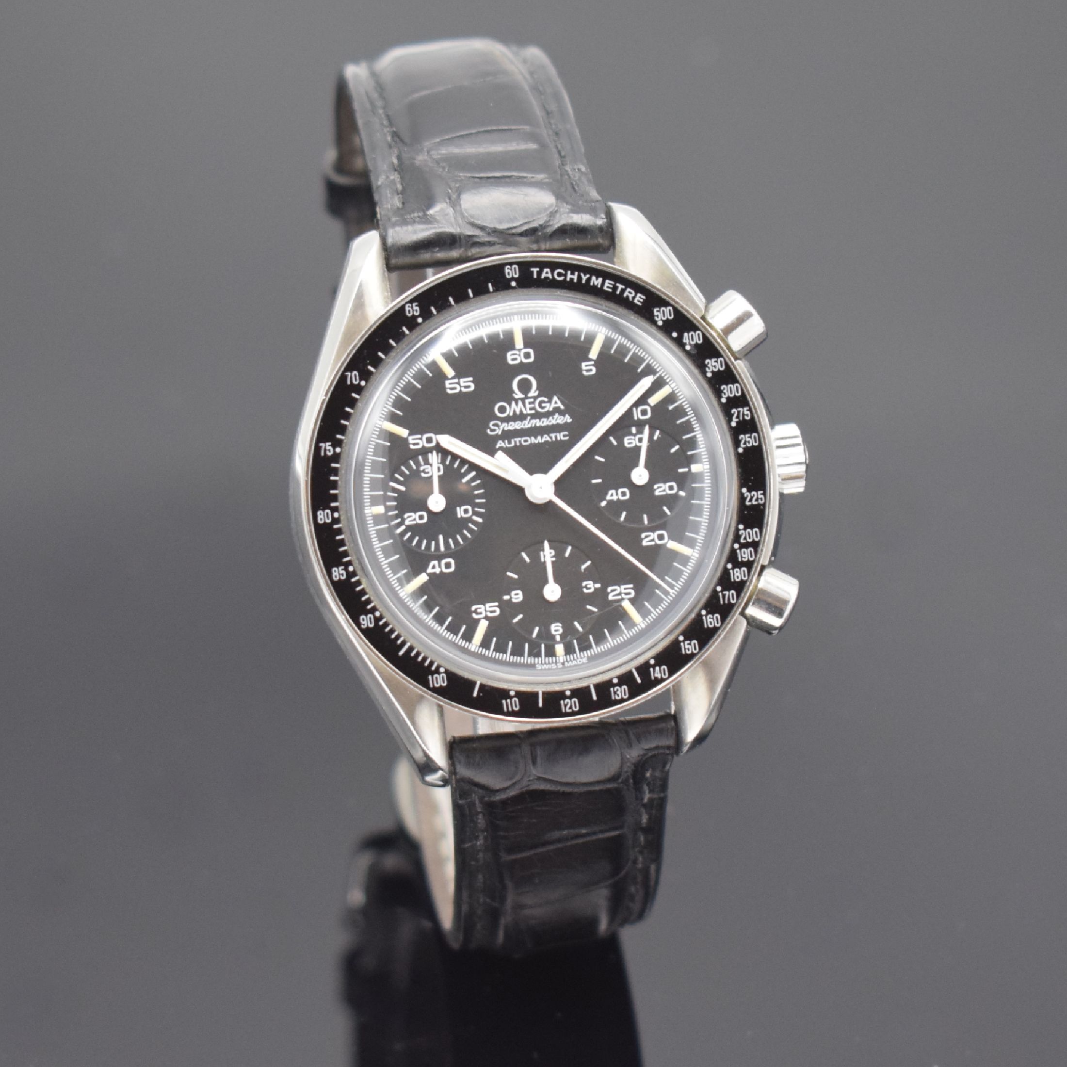 Detail b: OMEGA Armbandchronograph Speedmaster Reduced Referenz 175.0032, Automatik, Schweiz um 1990, Edelstahlgeh. inkl. Lederband m. orig. Dornschl., Boden ...