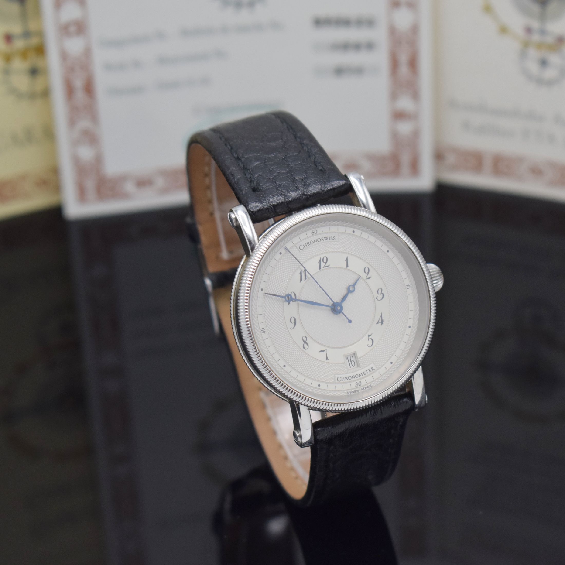 Detail b: CHRONOSWISS seltener Armbandchronometer Referenz CH 2823, Automatik, Edelstahlgeh. beids. Saphirvergl., Boden verschr., Silberzifferbl. z. T. guill., ...