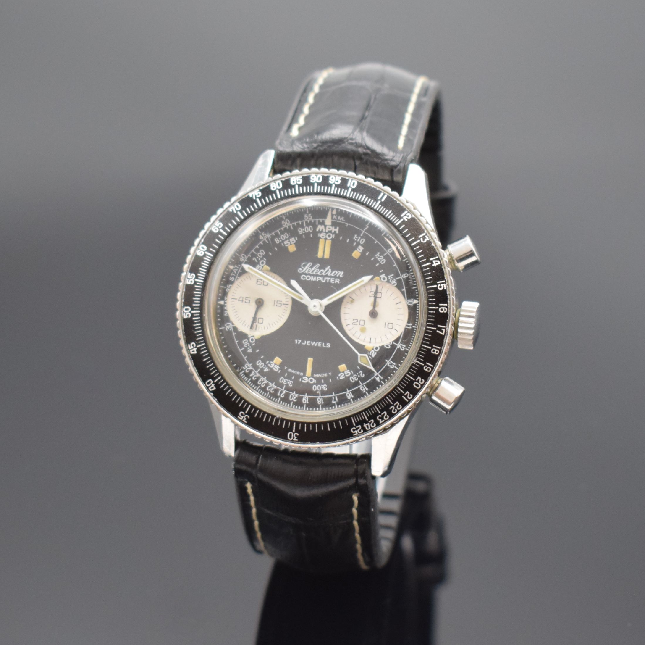 SELECTRON Computer Olech & Weiss sportlicher Herrenchronograph in Stahl, Schweiz um 1970, Handaufzug, verschr. Geh., schwarze ...