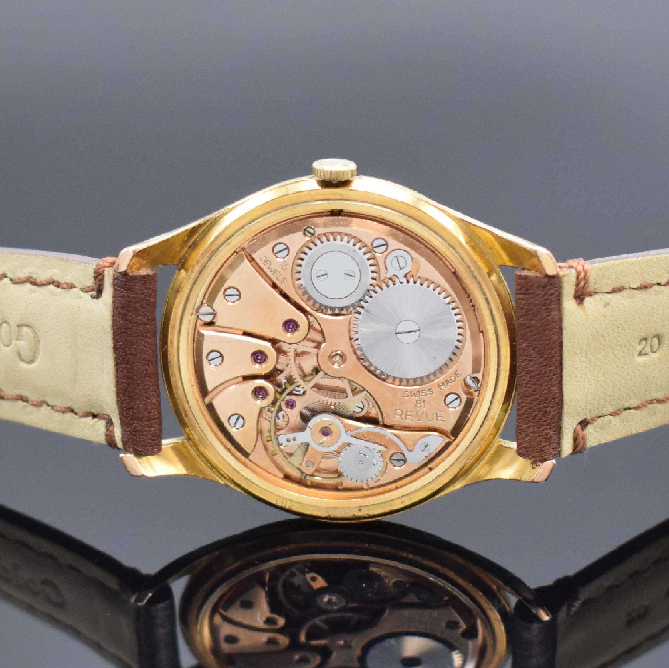 Detail d: REVUE Centenaire Kaliber 81 große Herrenarmbanduhr, Schweiz um 1955, Handaufzug, verg. Geh., gedr. Stahlboden, silb. Zifferbl. pat., gold. Indizes ...