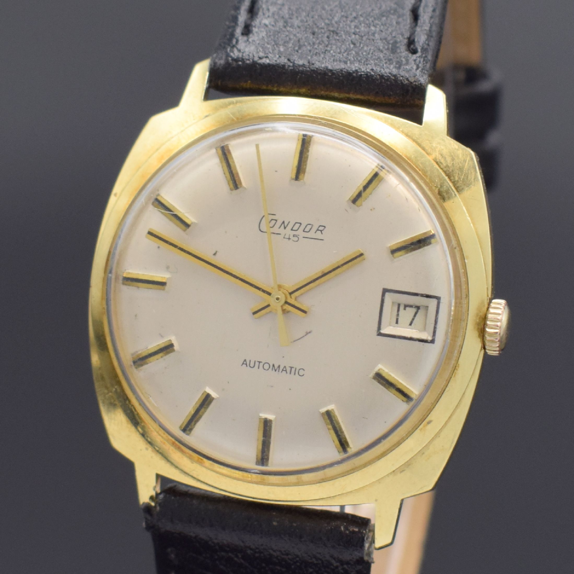 Detail a: CONDOR Herrenarmbanduhr in GG 585/000, Schweiz um 1970, Automatik, Boden aufgedr., silb. Zifferbl. m. aufges. gold. Std.-Ind., gold. Zeiger, Datum b. ...