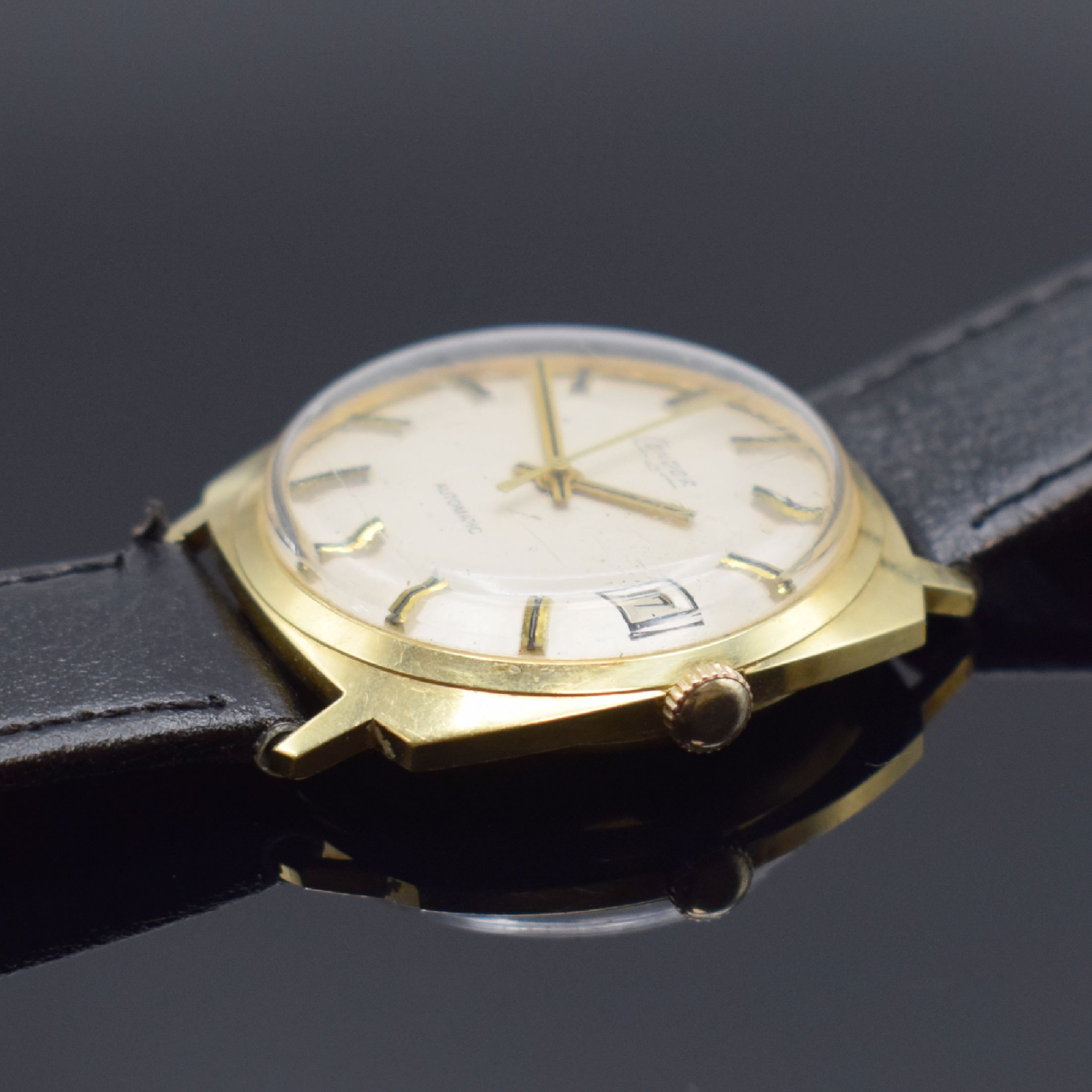 Detail b: CONDOR Herrenarmbanduhr in GG 585/000, Schweiz um 1970, Automatik, Boden aufgedr., silb. Zifferbl. m. aufges. gold. Std.-Ind., gold. Zeiger, Datum b. ...