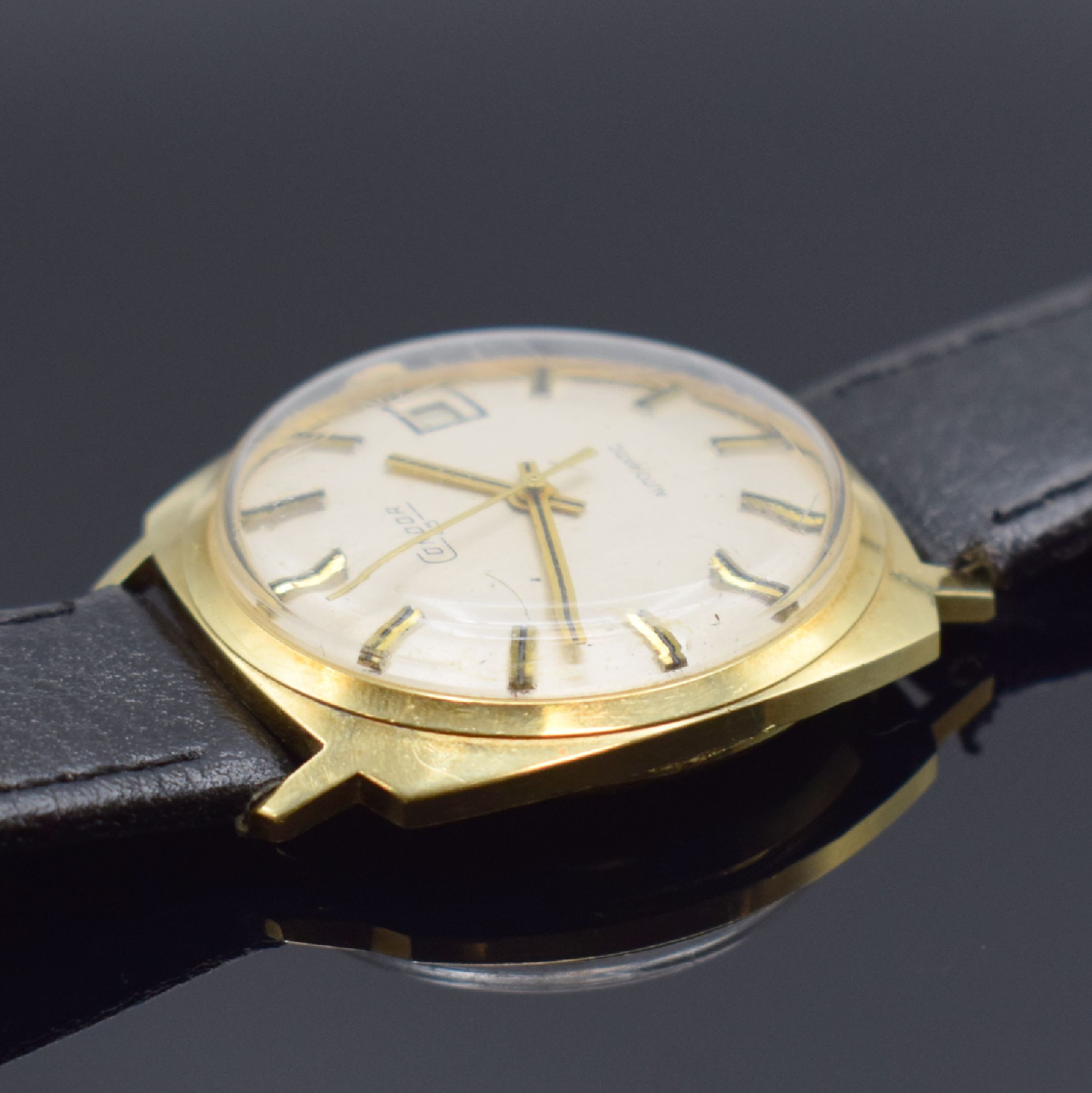 Detail c: CONDOR Herrenarmbanduhr in GG 585/000, Schweiz um 1970, Automatik, Boden aufgedr., silb. Zifferbl. m. aufges. gold. Std.-Ind., gold. Zeiger, Datum b. ...