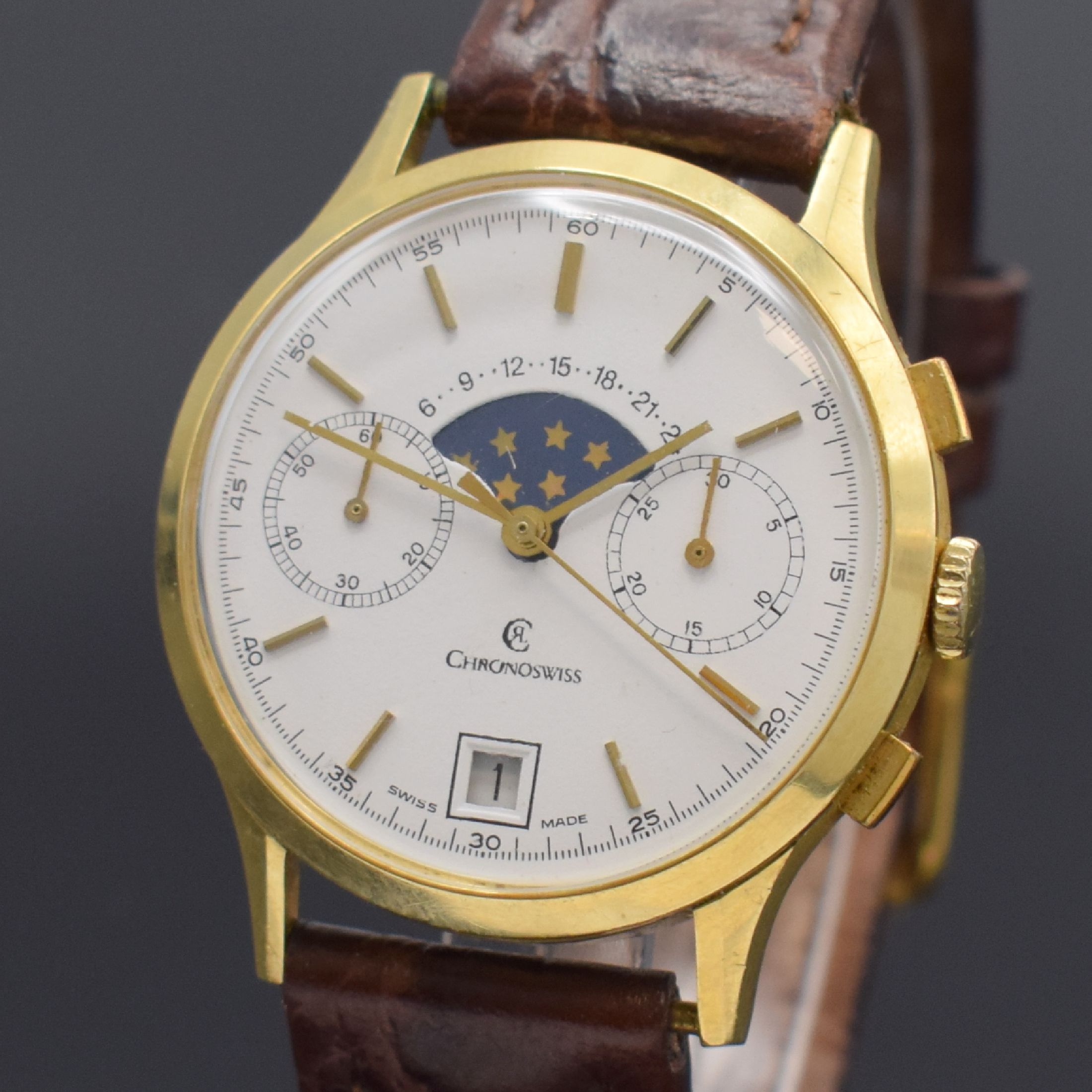 Detail a: CHRONOSWISS Herrenarmbanduhr mit Chronograph, Mondphase und Datum in GG 750/000, Schweiz um 1980, Handaufzug, 3-teil. Geh. dell., Boden und Glasrand ...