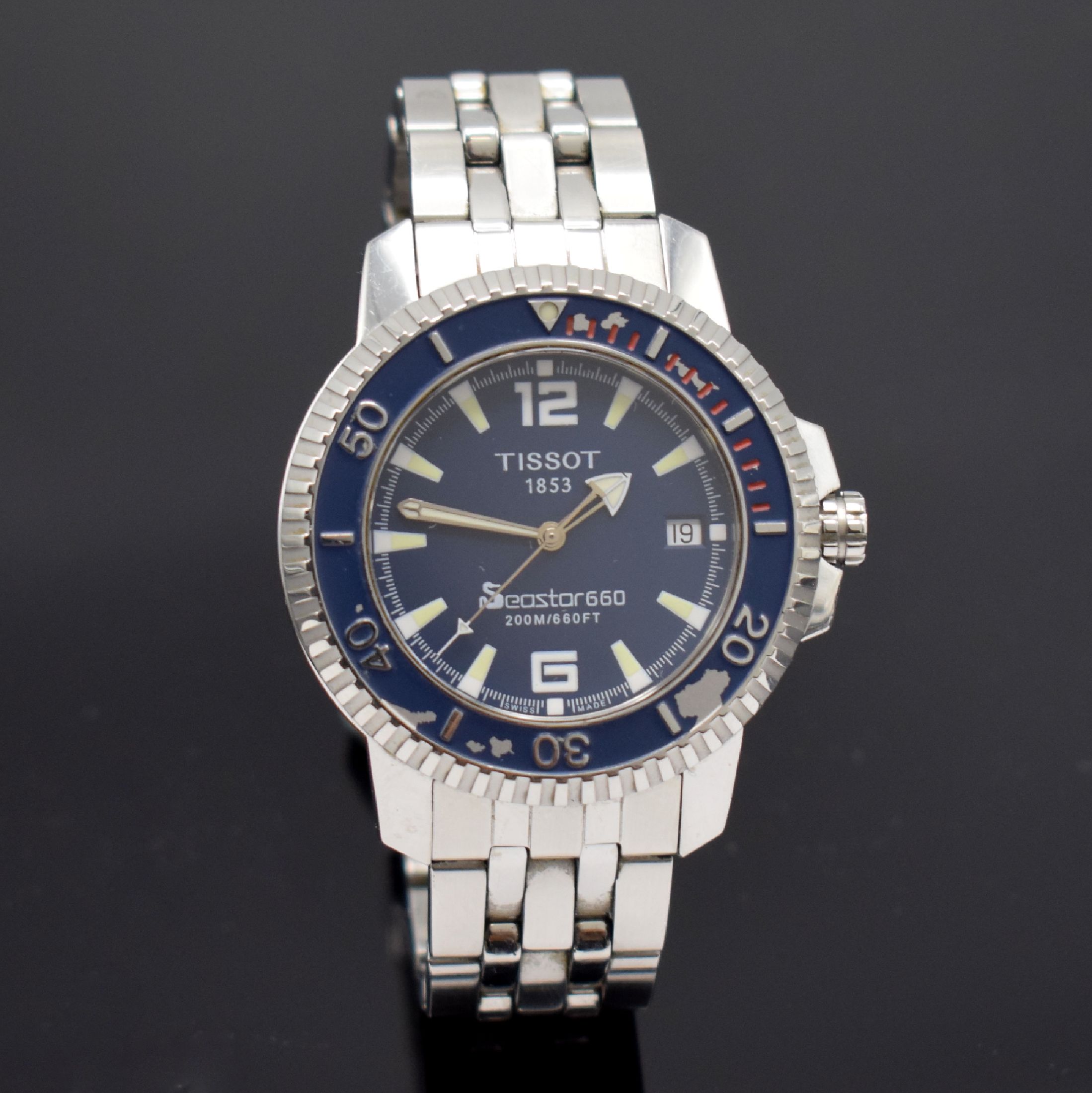 TISSOT Seastar 660 Herrenarmbanduhr, Schweiz um 2004, quarz, verschr. Edelstahlgeh. inkl. Gliederband m. Faltschl., drehb. Lünette besch., blaues ...