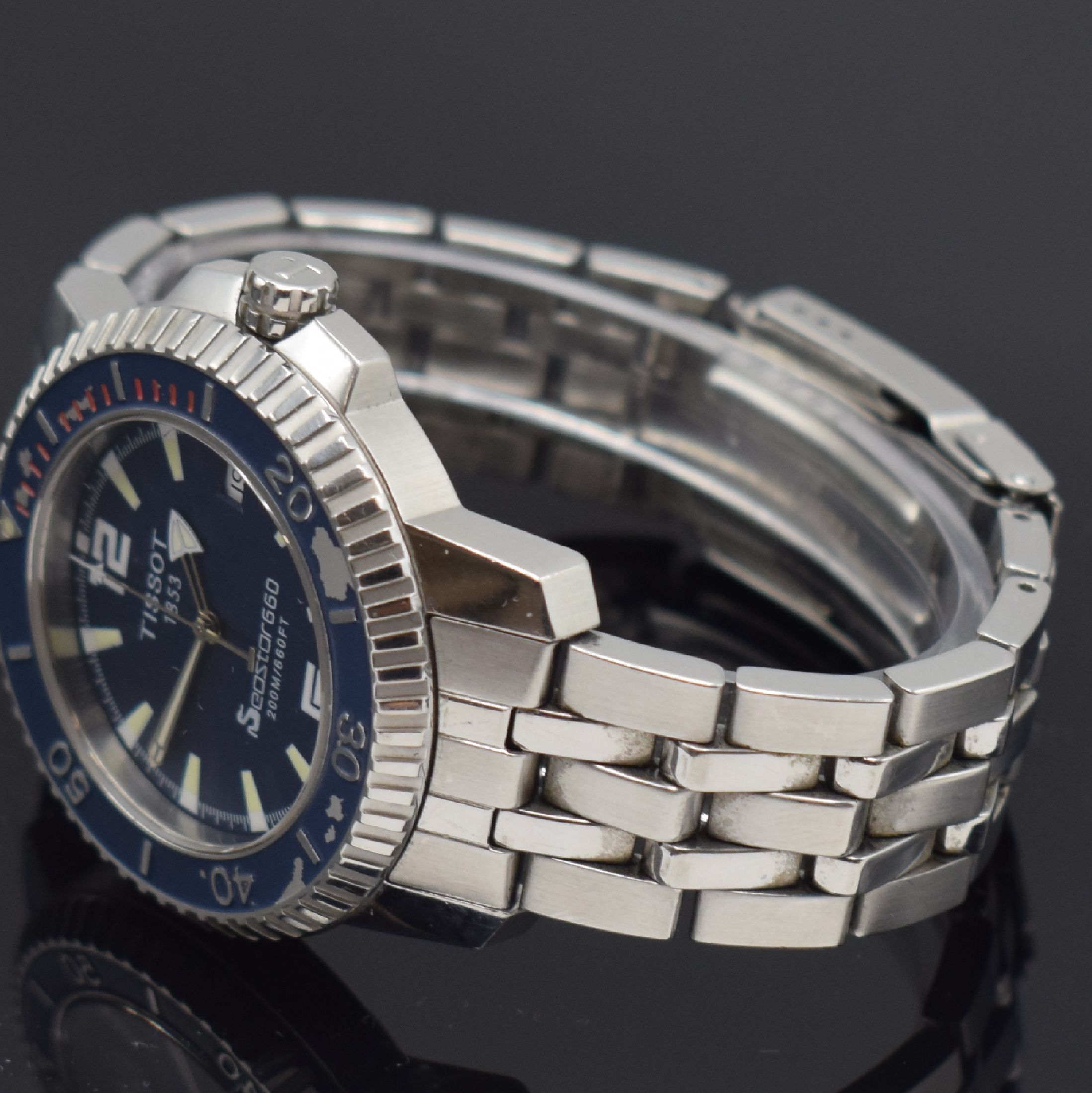 Detail b: TISSOT Seastar 660 Herrenarmbanduhr, Schweiz um 2004, quarz, verschr. Edelstahlgeh. inkl. Gliederband m. Faltschl., drehb. Lünette besch., blaues ...