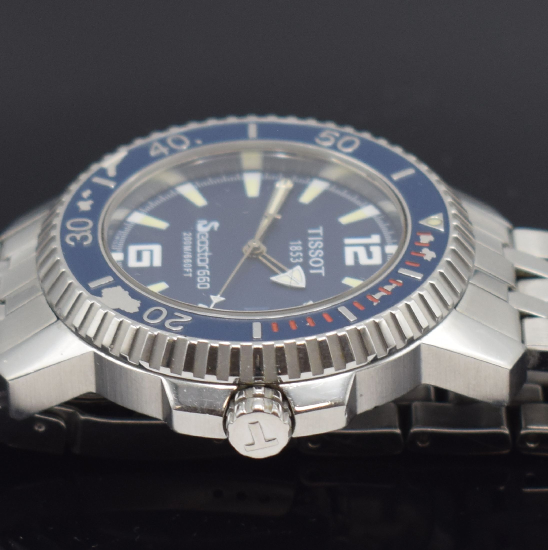 Detail d: TISSOT Seastar 660 Herrenarmbanduhr, Schweiz um 2004, quarz, verschr. Edelstahlgeh. inkl. Gliederband m. Faltschl., drehb. Lünette besch., blaues ...