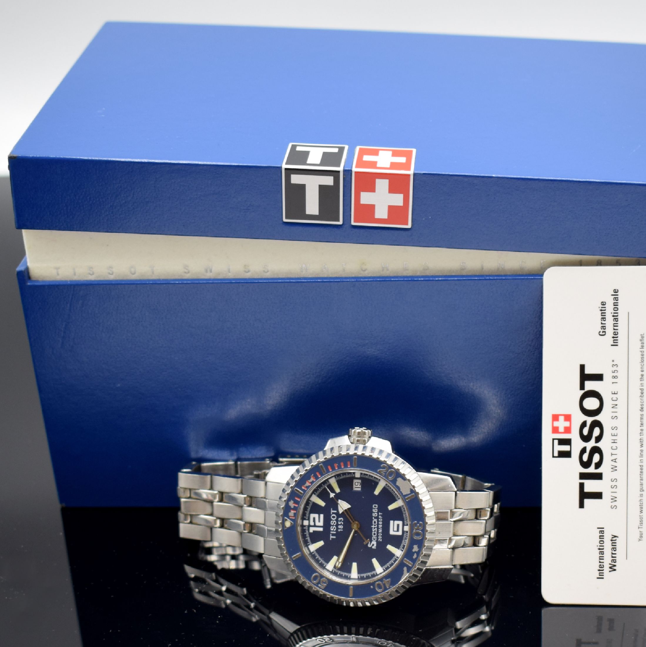 Detail f: TISSOT Seastar 660 Herrenarmbanduhr, Schweiz um 2004, quarz, verschr. Edelstahlgeh. inkl. Gliederband m. Faltschl., drehb. Lünette besch., blaues ...