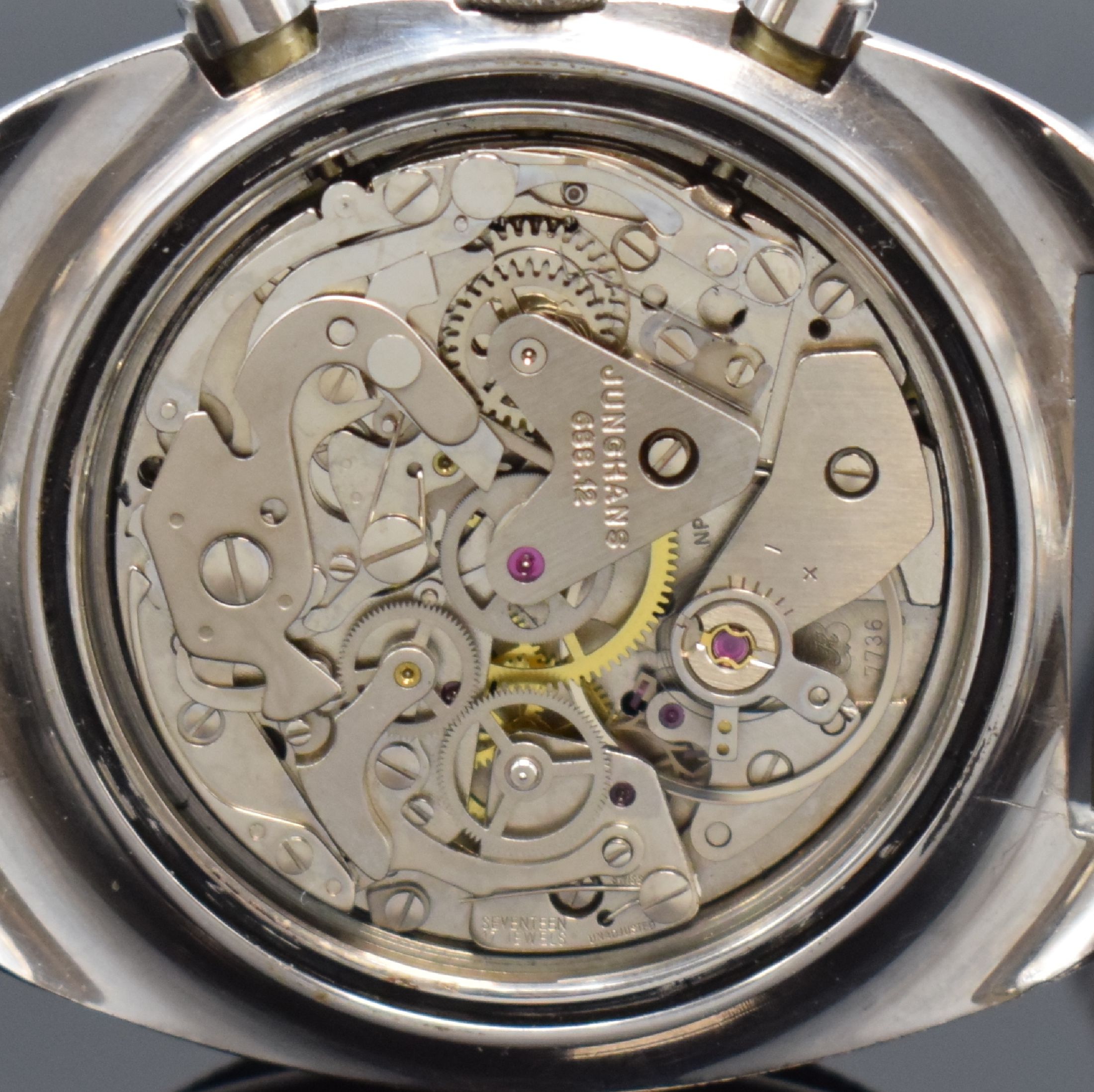 Detail e: JUNGHANS Olympic Herrenarmbanduhr mit Chronograph in Stahl, Schweiz / Deutschland um 1970, Handaufzug, 2-teil. Gehäuse, Boden geschr., unsign. ...