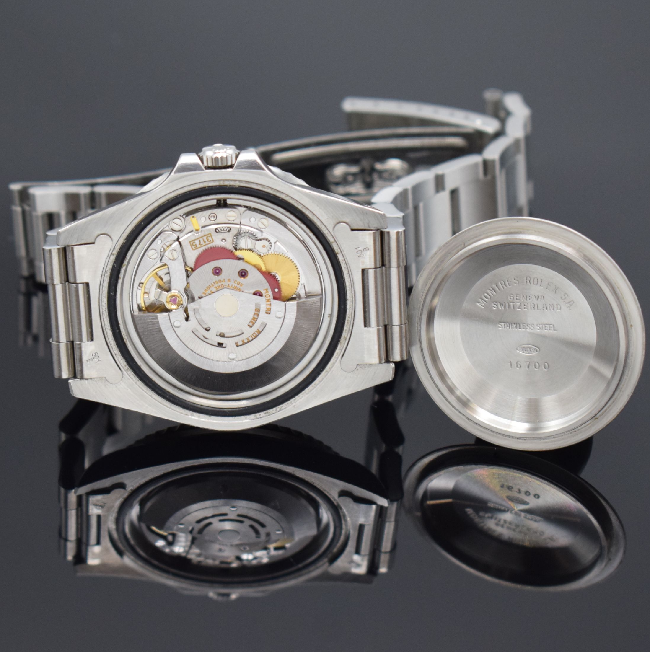 Detail e: ROLEX Herrenarmbanduhr Oyster Perpetual Date GMT-Master Referenz 16700, Schweiz um 1990, Automatik, Chronometer der Superlative in Edelstahl inkl. ...
