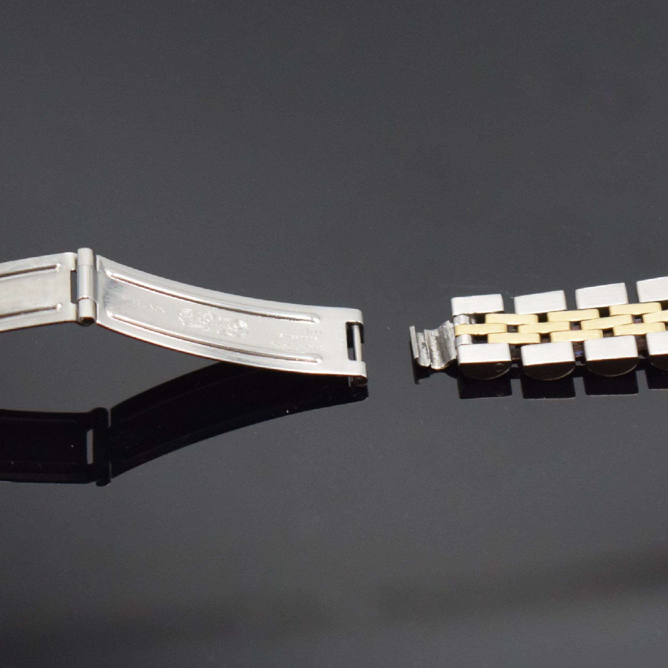 Detail c: ROLEX Band für Damenarmbanduhr, Box und Übersetzung, Schweiz, 1) Band Ref. 62523-D14 in Stahl/Gold, an d. Schließe def., zu rep. o. als ...