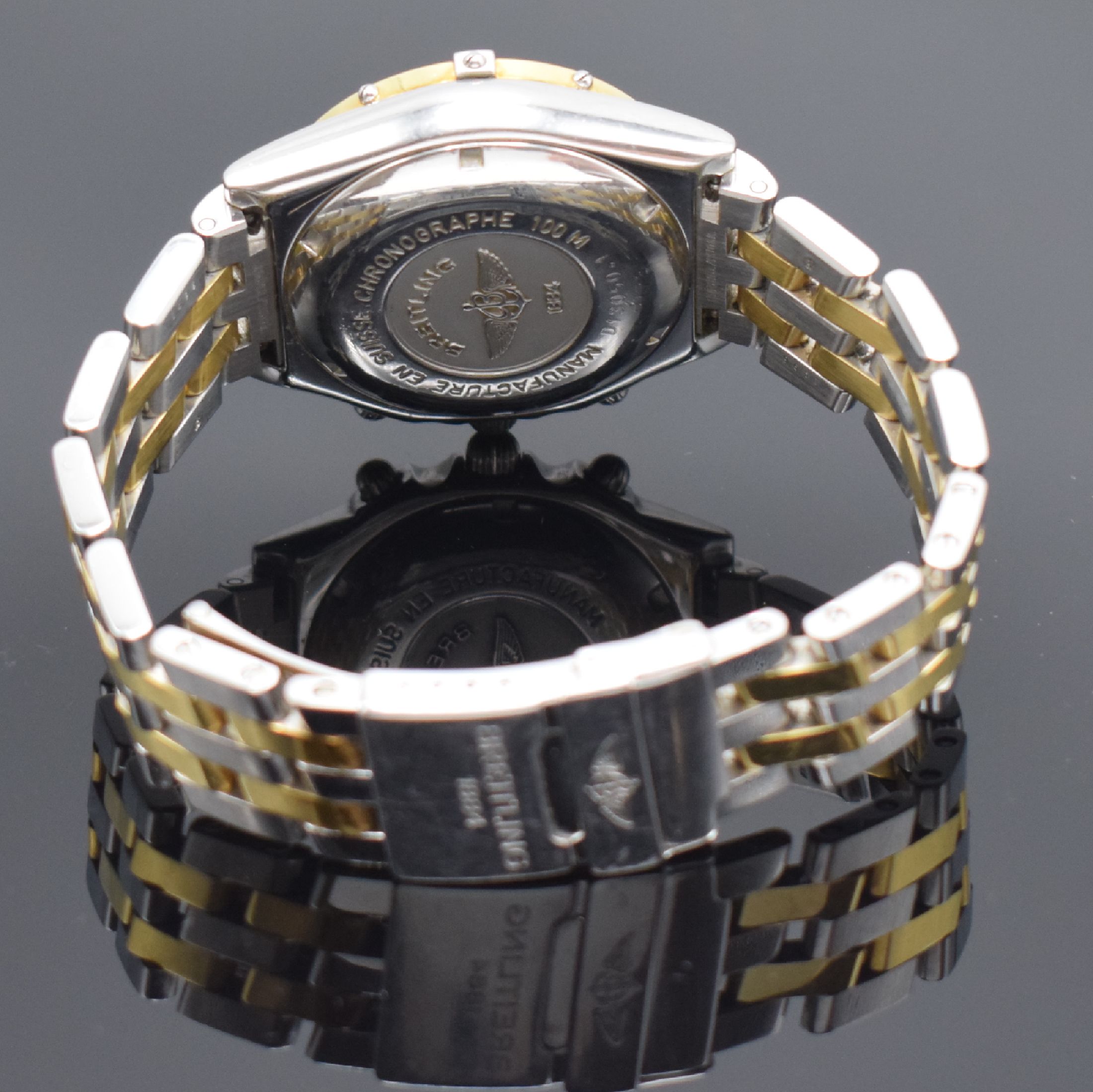 Detail d: BREITLING Chronomat Herrenarmbanduhr mit Chronograph Referenz D13050.1, Schweiz um 1995, Automatik, Edelstahl/Gold komb., verschr. Geh., Pilotband m. ...
