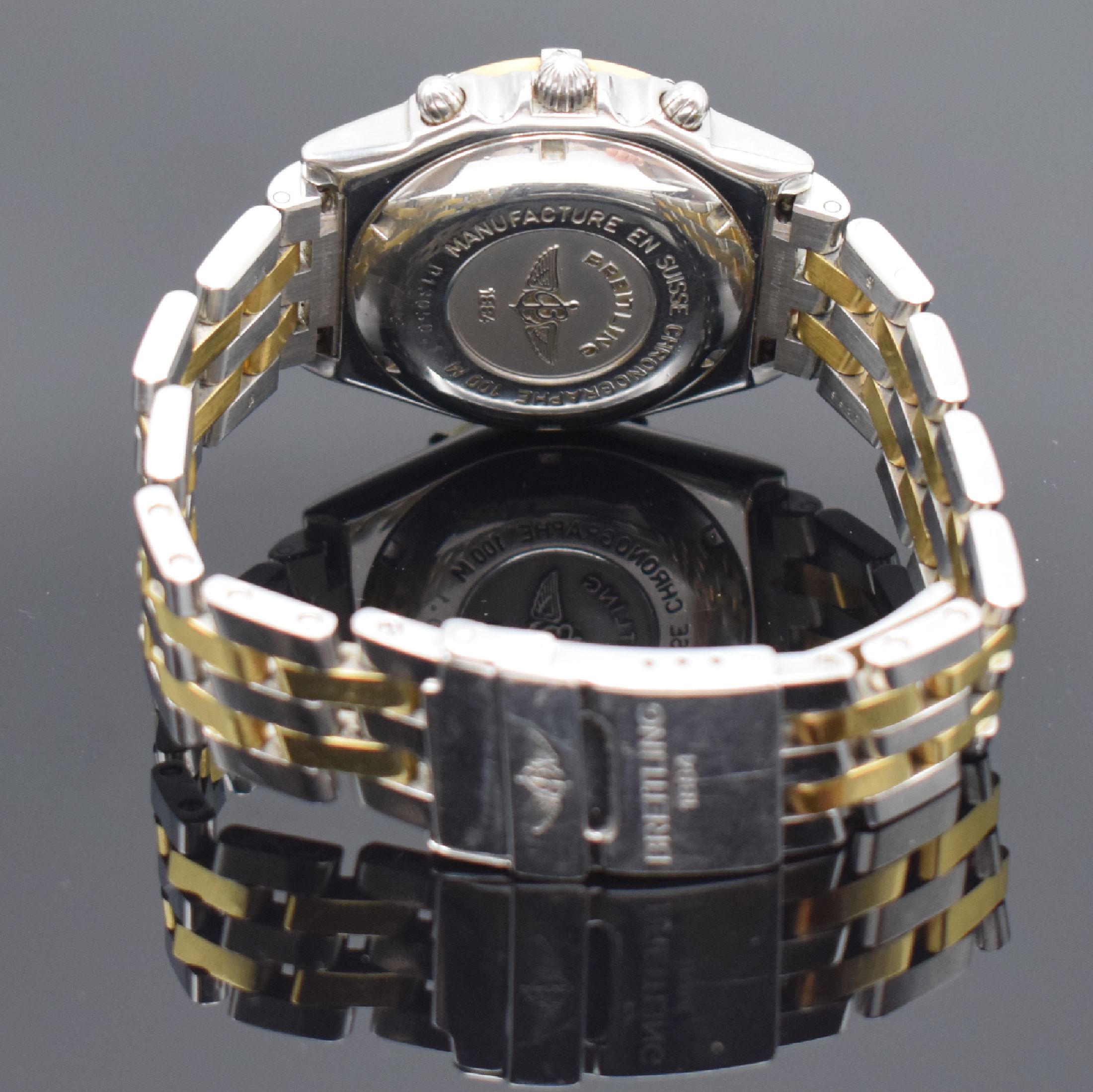 Detail e: BREITLING Chronomat Herrenarmbanduhr mit Chronograph Referenz D13050.1, Schweiz um 1995, Automatik, Edelstahl/Gold komb., verschr. Geh., Pilotband m. ...