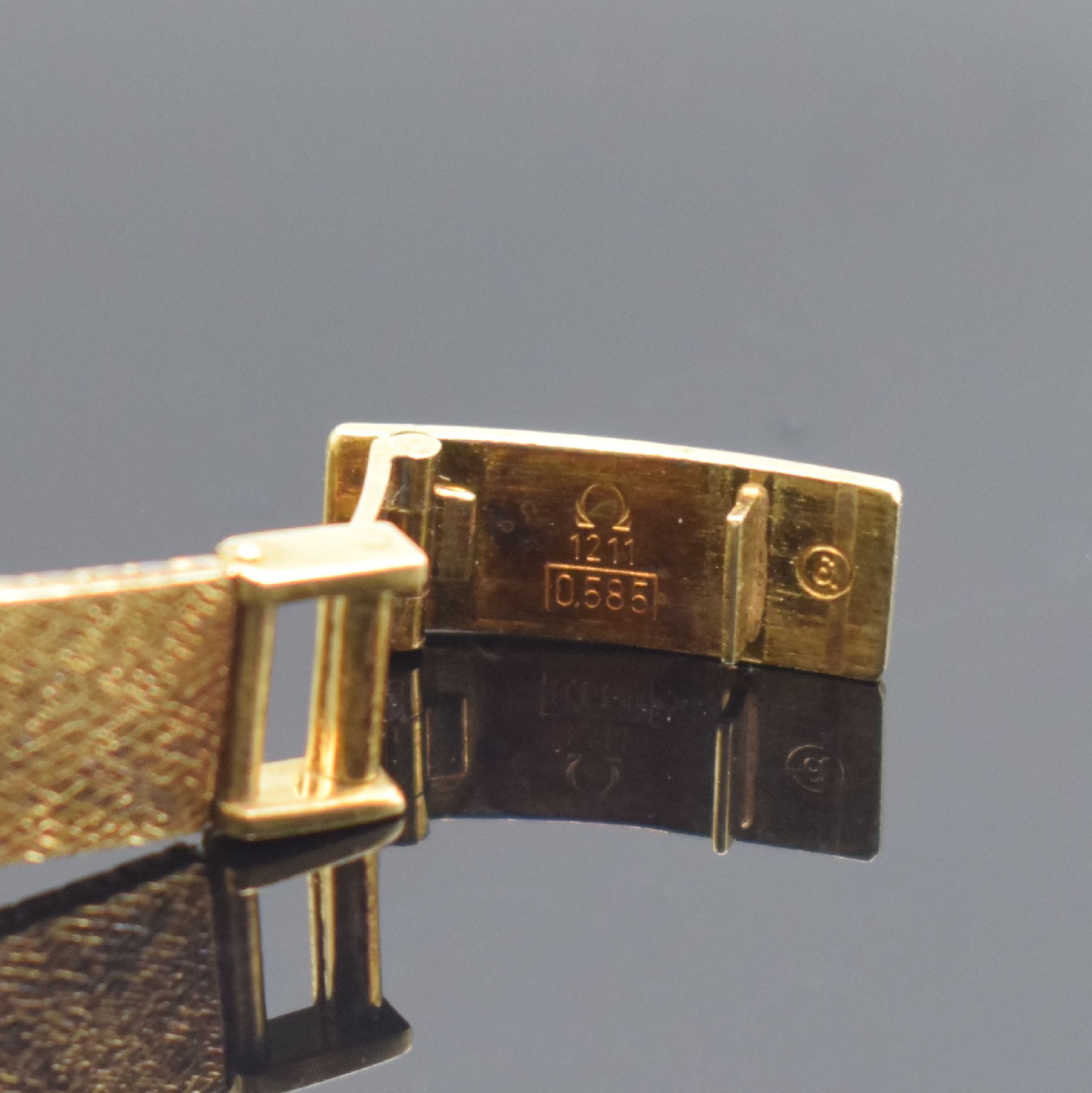 Detail c: OMEGA Damenarmbanduhr in GG 585/000, Schweiz um 1973, Automatik, Boden aufgedr., champagnerfarb. Zifferbl. m. aufgel. Std.- Ind., schwarze Zeiger, ...