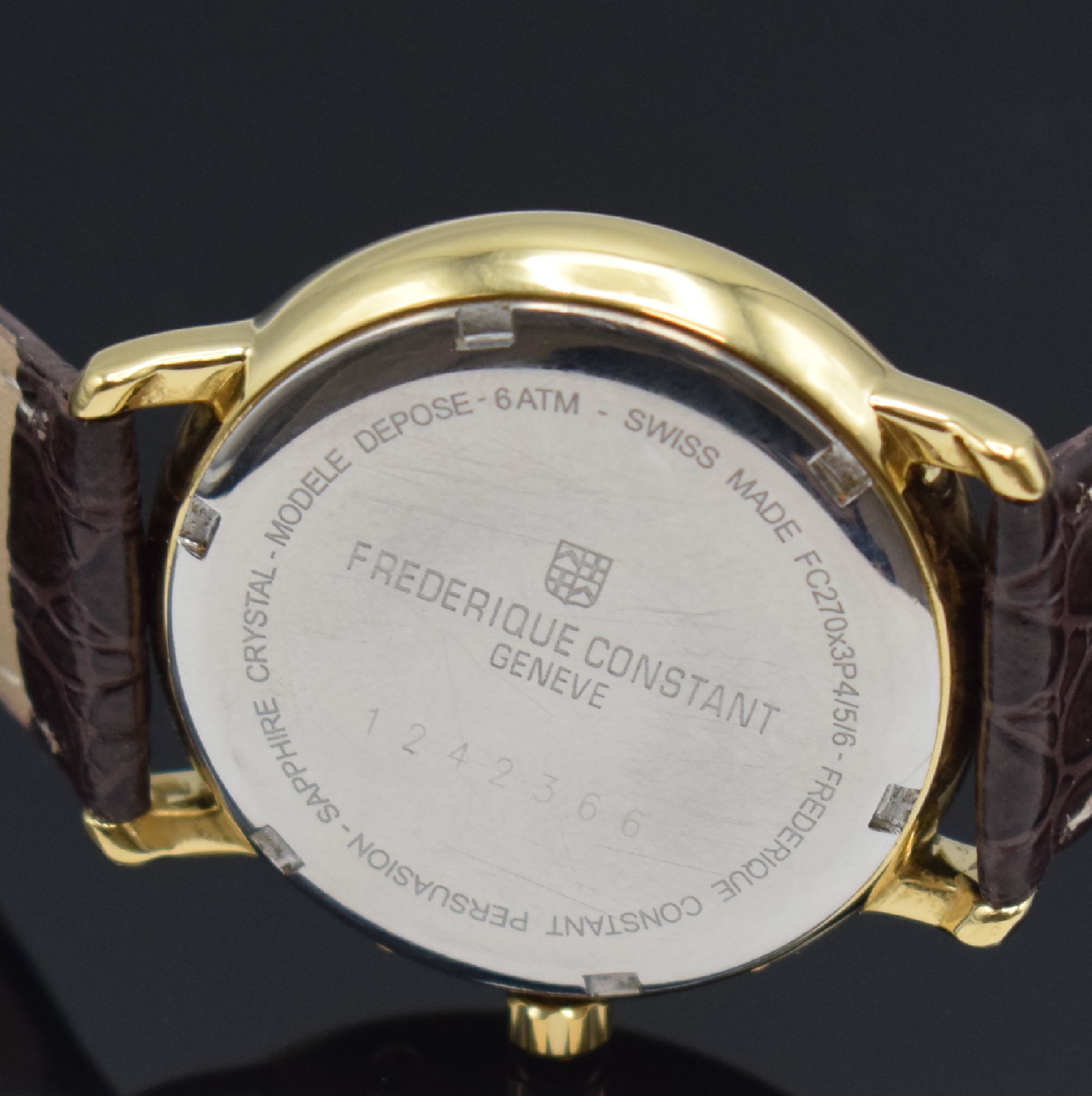Detail h: FREDERIQUE CONSTANT Classics Business Timer Herrenarmbanduhr mit Kalender Referenz FC270x3P4/5/6, Schweiz um 2010, quarz, verg.Gehäuse, Boden ...