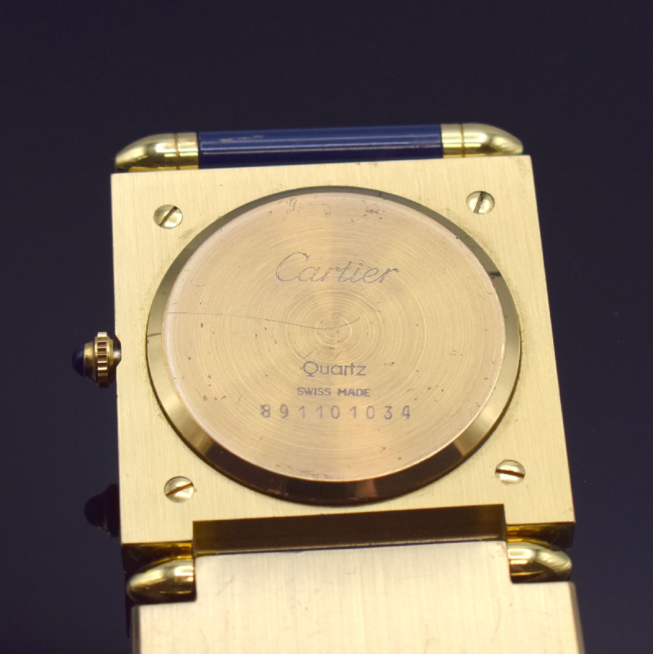 Detail d: CARTIER kleiner Tischwecker, Schweiz um 1990, quarz, verg., ausklappbares Gehäuse, Lünette m. lack. römischen Zahlen, silb. Zifferbl., silb. ...