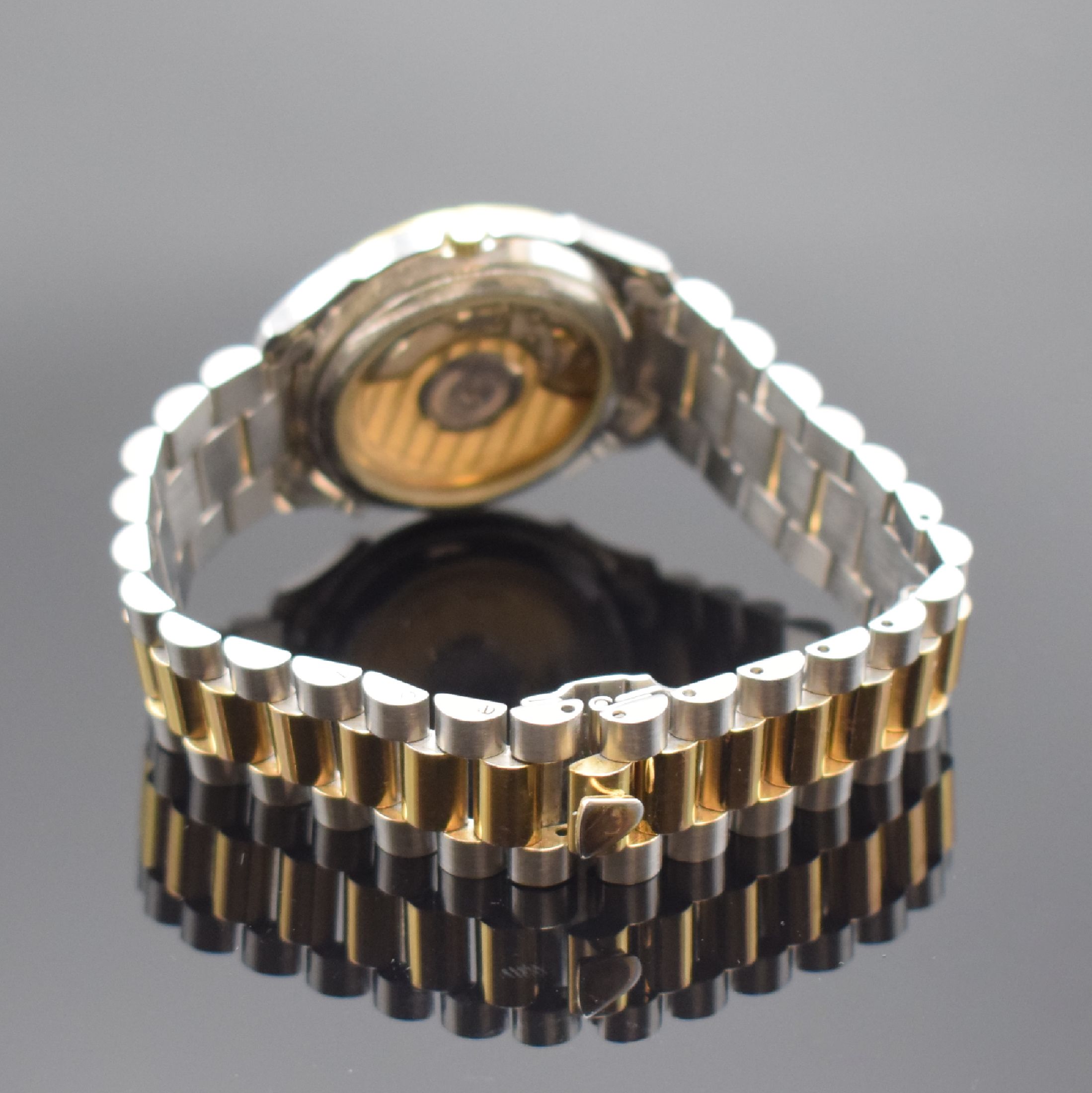 Detail b: GUB Glashütte/SA Herrenarmbanduhr, Deutschland um 1990, Automatik, beids. vergl. z. T. verg./verchr., Gliederband m. Faltschl.,Boden aufgedr., ...