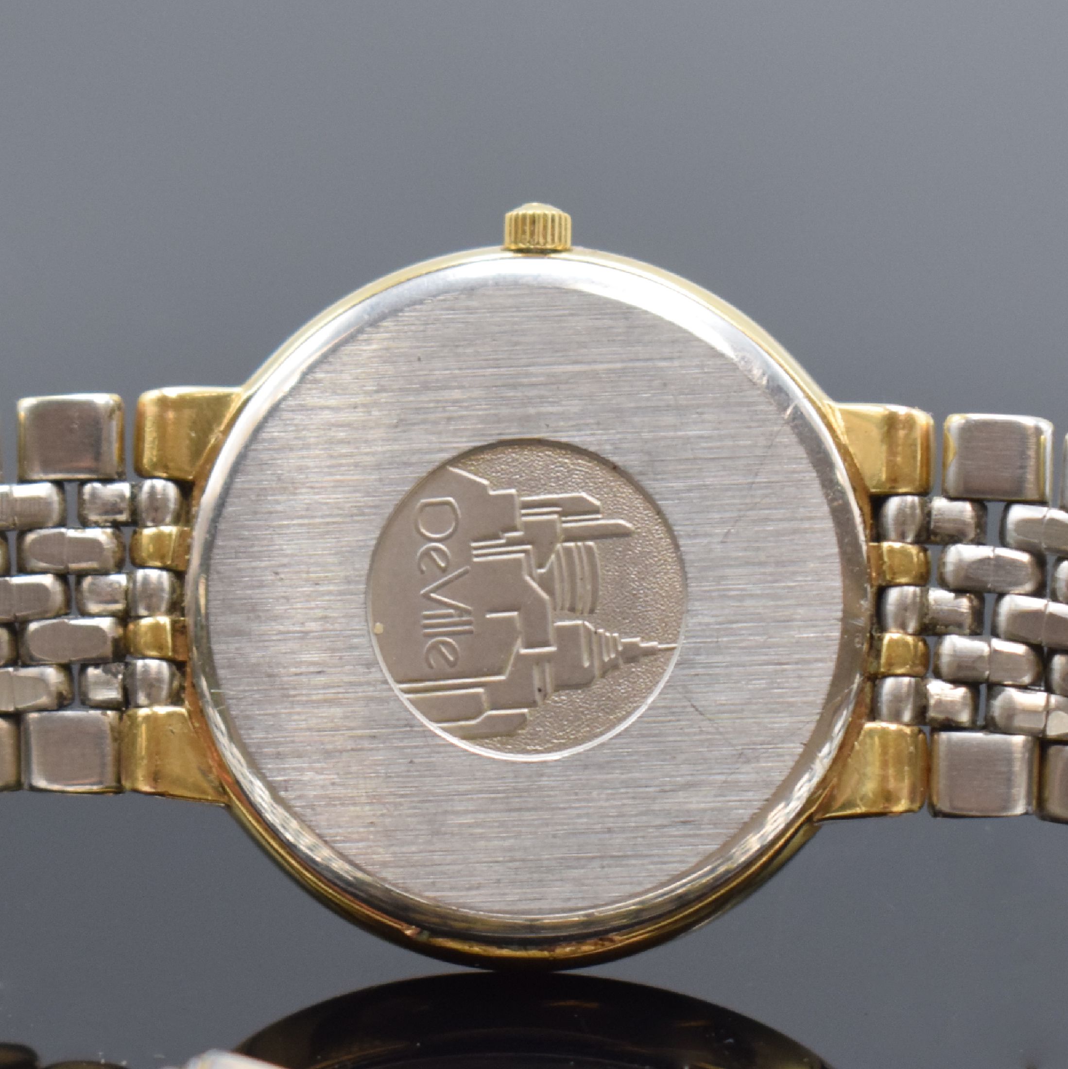 Detail d: OMEGA De Ville Herrenarmbanduhr Referenz 3961012, Schweiz 1980er Jahre, quarz, verg. Geh. inkl. Gliederband m. Faltschl., Edelstahlboden aufgedr., ...