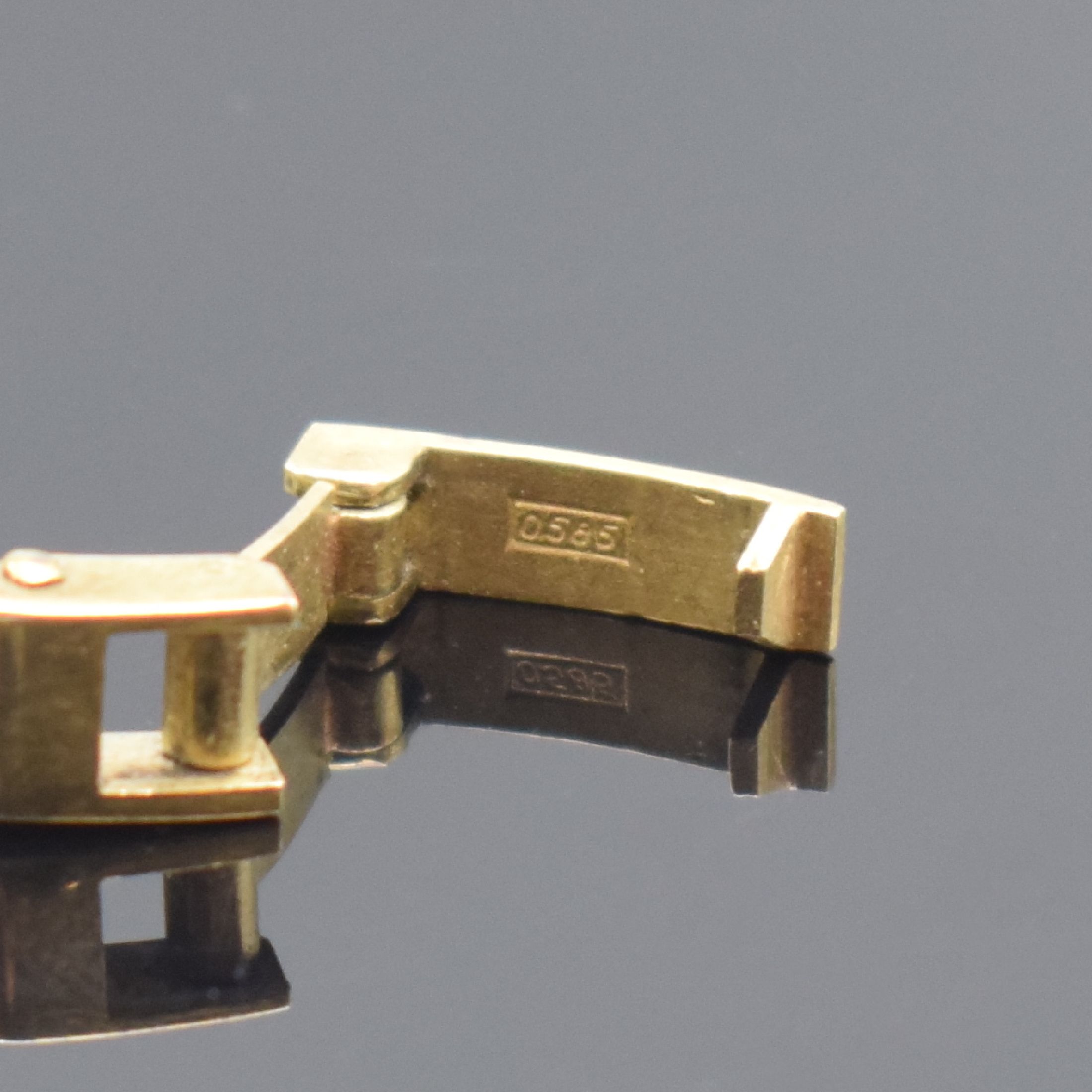 Detail b: TASSO Damenarmbanduhr in GG 585/000, Schweiz um 1975, Handaufzug, Boden aufgedr., silb. Zifferbl. altersbed. pat., aufgel. Std.-Ind., gold. Zeiger, ...