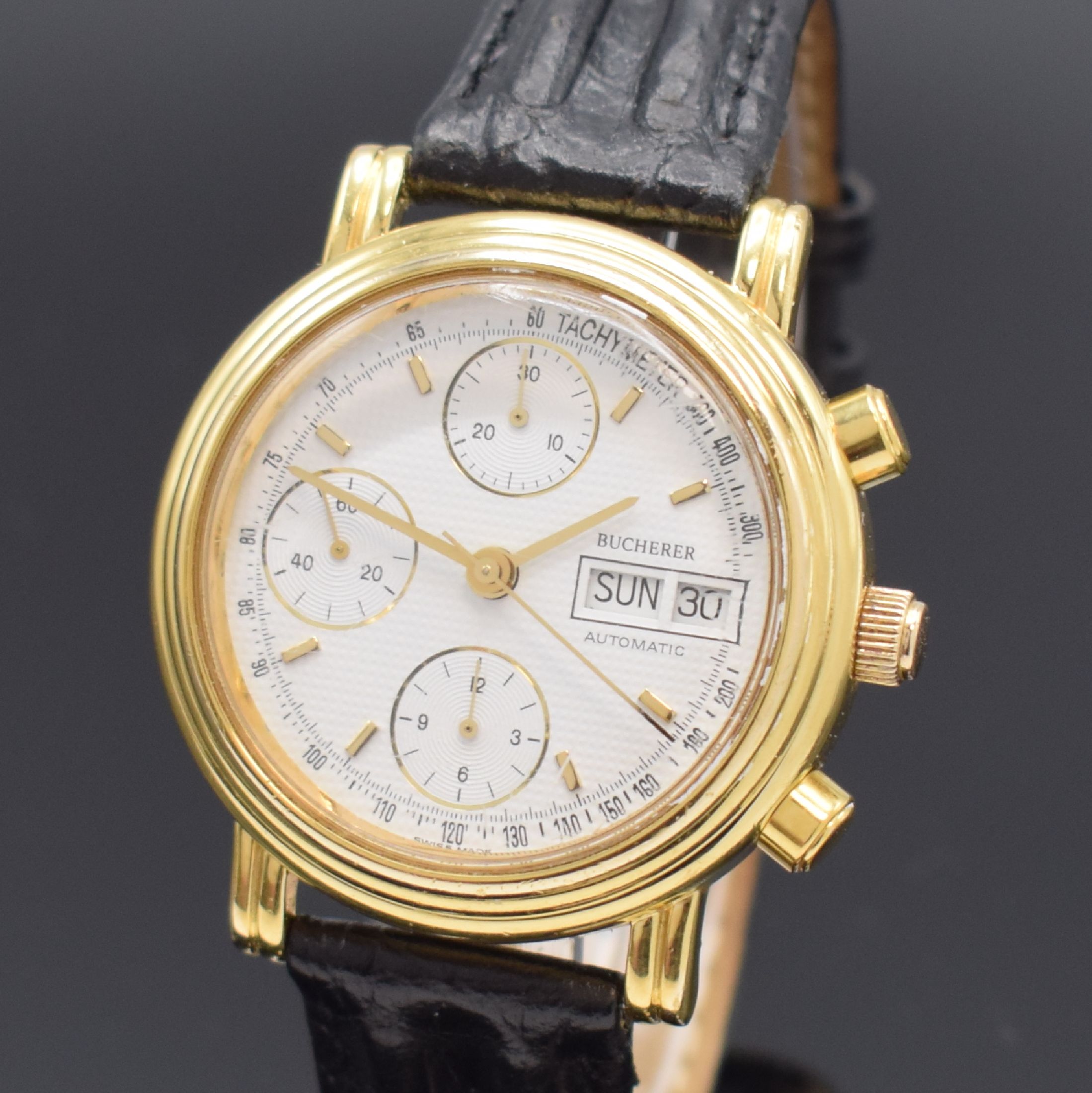 Detail a: BUCHERER Armbandchronograph Referenz 4.038.0.0.10, Automatik, Schweiz um 1990, verg. Geh. beids. vergl., Boden aufgedr., emailfarb. Zifferbl. m. ...