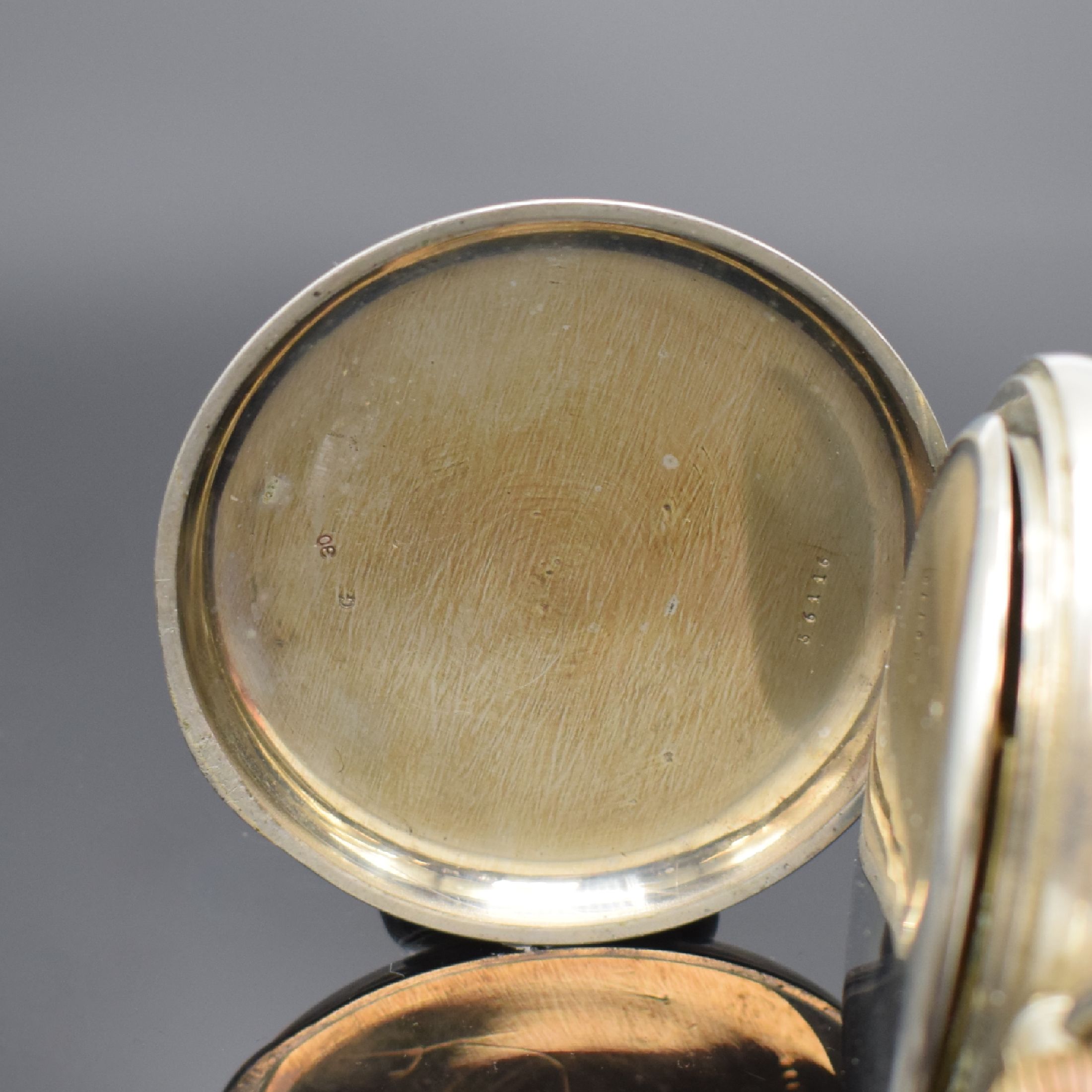 Detail b: Übergroße Taschenuhr / Eisenbahneruhr im vernickelten Gehäuse, Schweiz um 1910, D. ca. 76 mm, glattes Geh. l. dell., Emailblatt m. fetten röm. ...