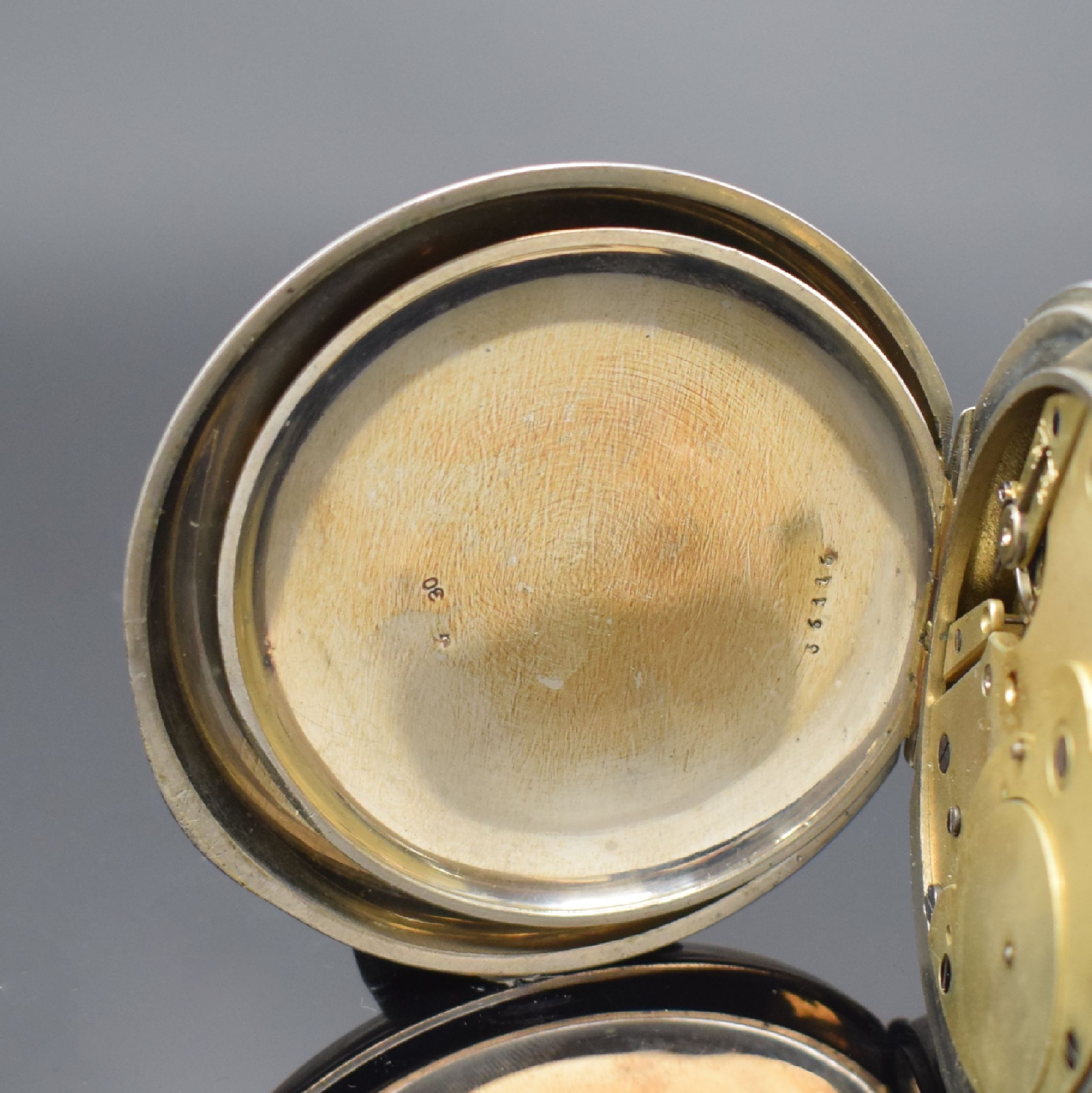 Detail d: Übergroße Taschenuhr / Eisenbahneruhr im vernickelten Gehäuse, Schweiz um 1910, D. ca. 76 mm, glattes Geh. l. dell., Emailblatt m. fetten röm. ...
