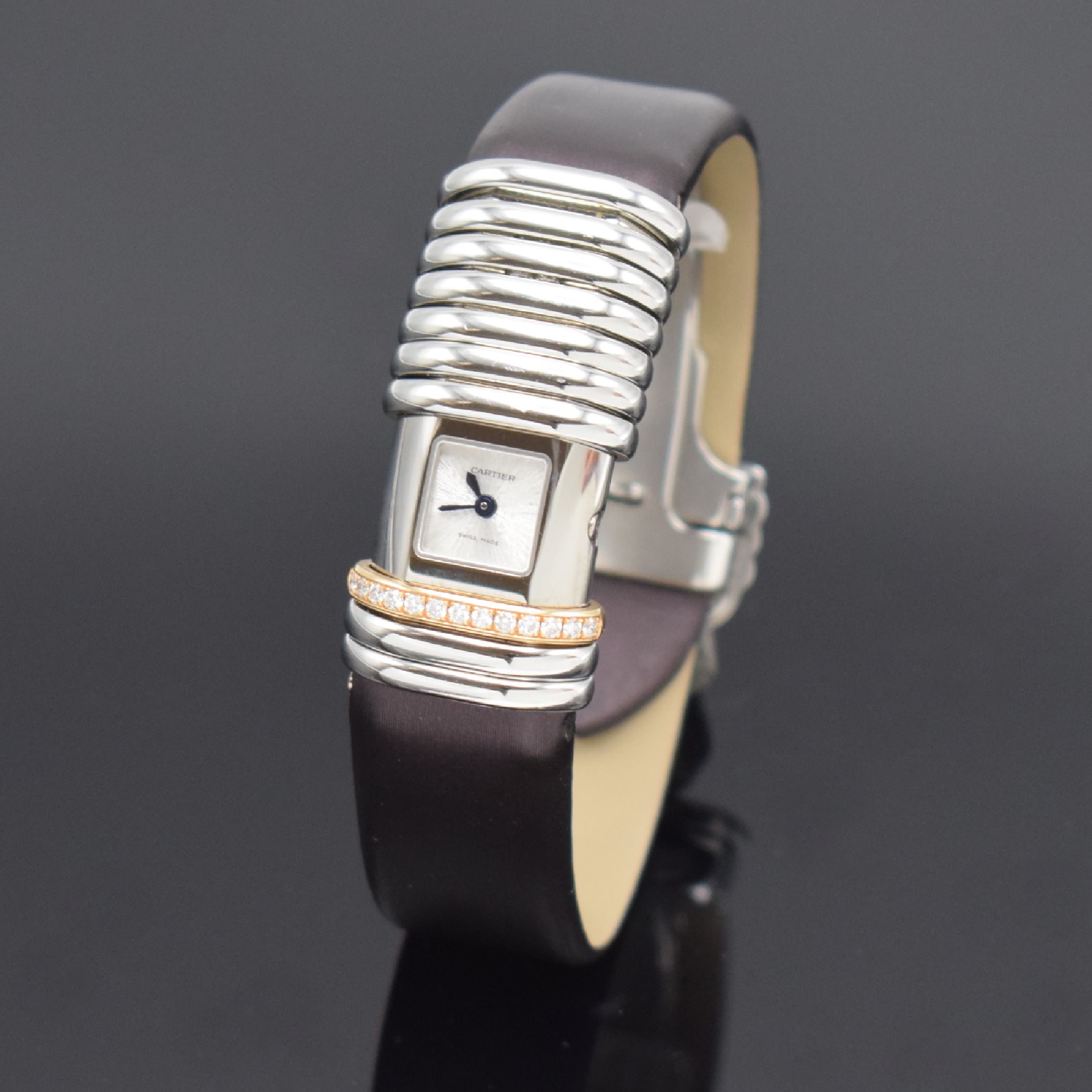 CARTIER Damenarmbanduhr Modellserie Declaration Referenz 2611, Edelstahlgeh. inkl. orig. Leder-/Satinband m. orig. Faltschl., 8 bewegliche Spangen, ...