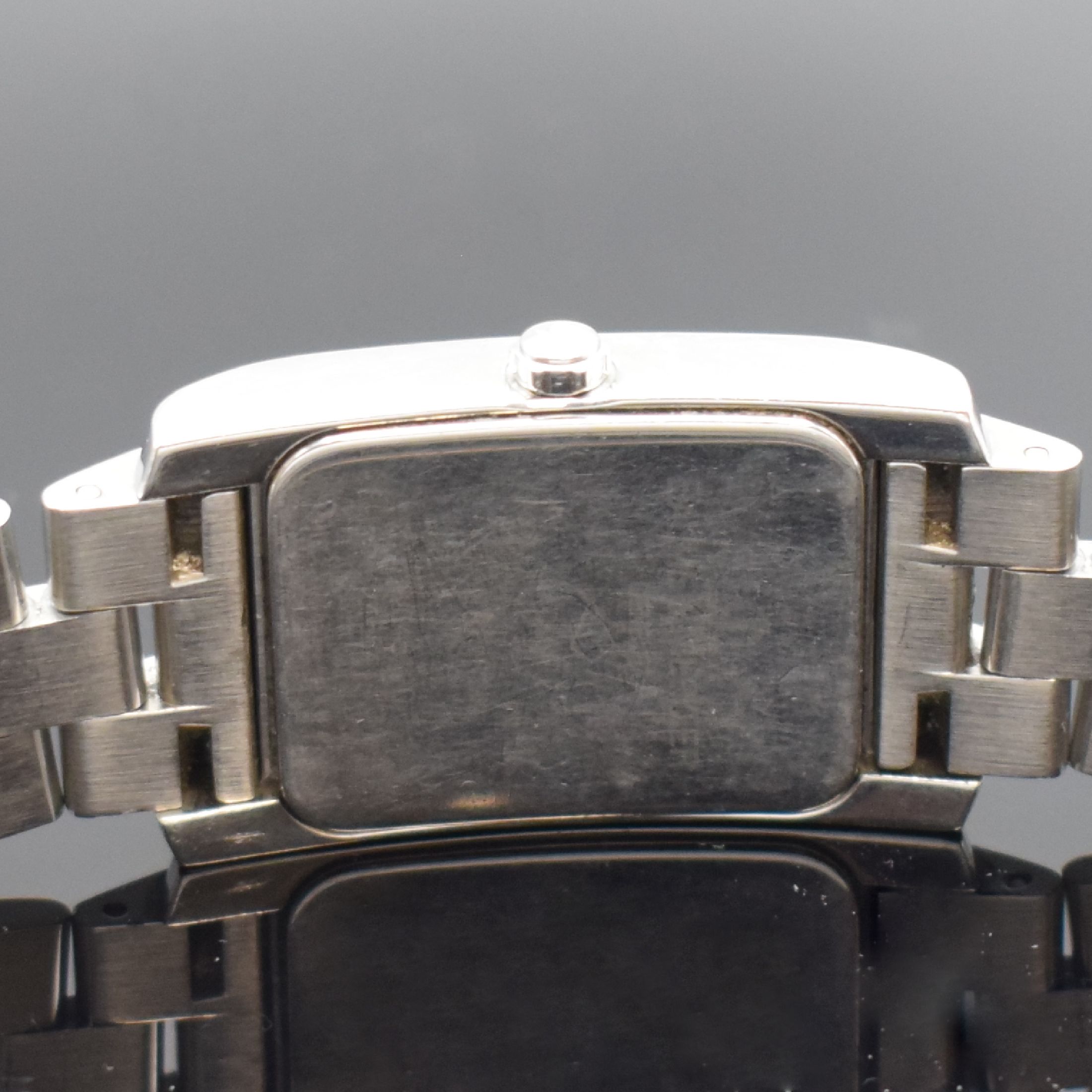 Detail d: BAUME & MERCIER Hampton Armbanduhr, Schweiz um 2000, Automatik, 2-teil. Geh., Boden aufgedr., Gliederband m. dopp. Faltschl., kupferfarb. Zifferbl., ...