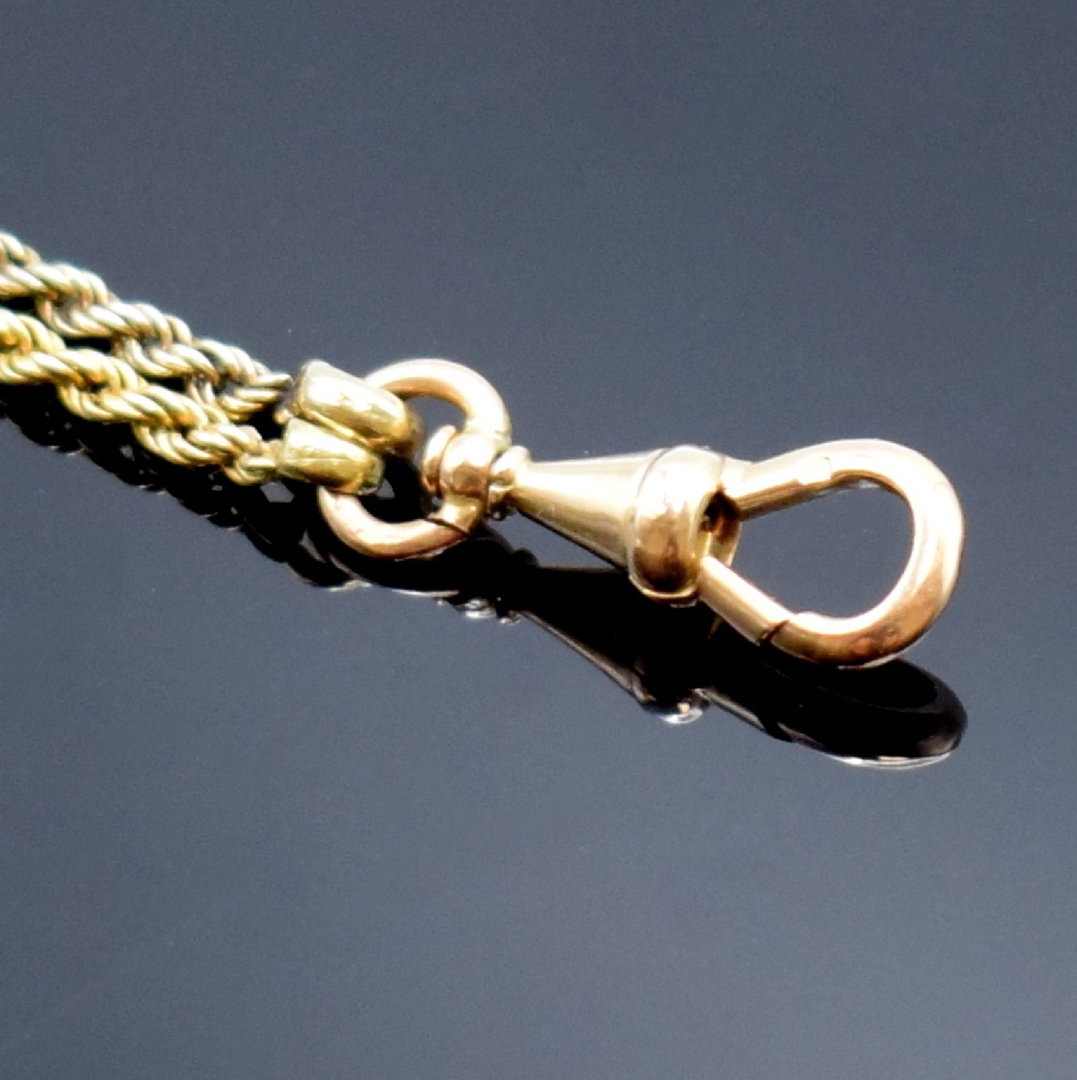Detail c: Taschenuhrkette in GG 750/000 mit kleinen Perlen, um 1930, m. Karabiner, L. ca. 85,5 cm, Gesamtgew. ca. 17g, in gebrauchsfähigem Zustand