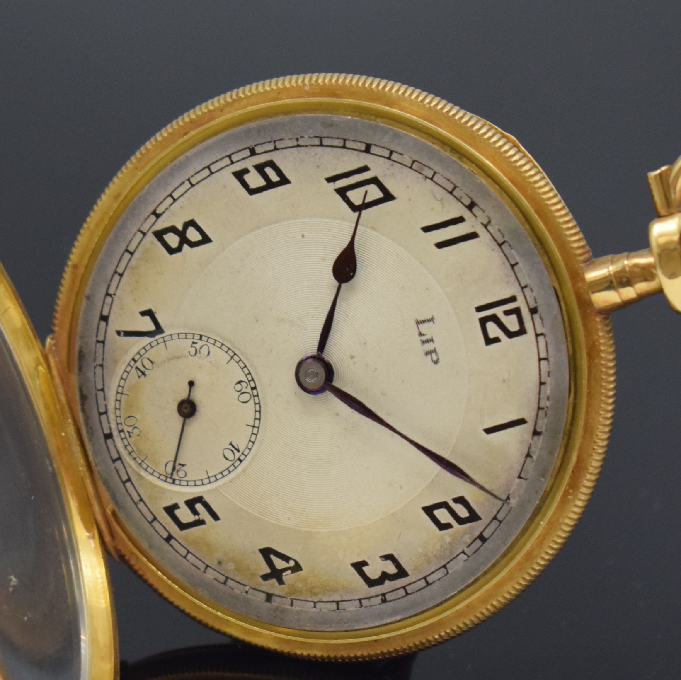 Detail a: LIP offene Taschenuhr in GG 750/000, Frankreich um 1920, Geh. m. Münzrand, Rückdeckel m. Streifendekor dell., Goldcuvette, Metallzifferbl. m. arab. ...