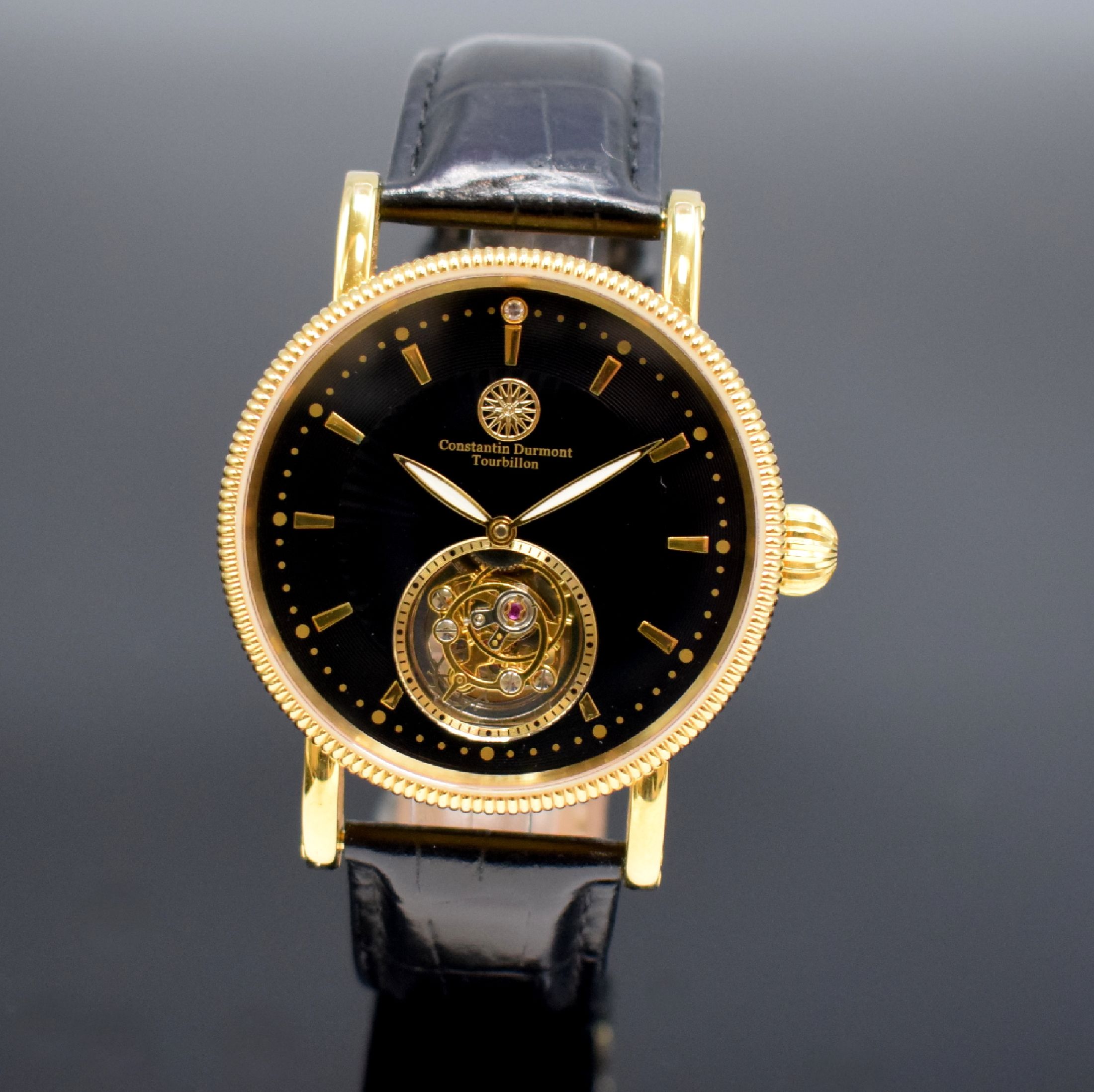 CONSTANTIN DURMONT Herrenarmbanduhr mit Tourbillon, um 2010, Handaufzug, verg. Edelstahlgehäuse, beids. vergl., Boden geschr., schw. Zifferbl. m. ...