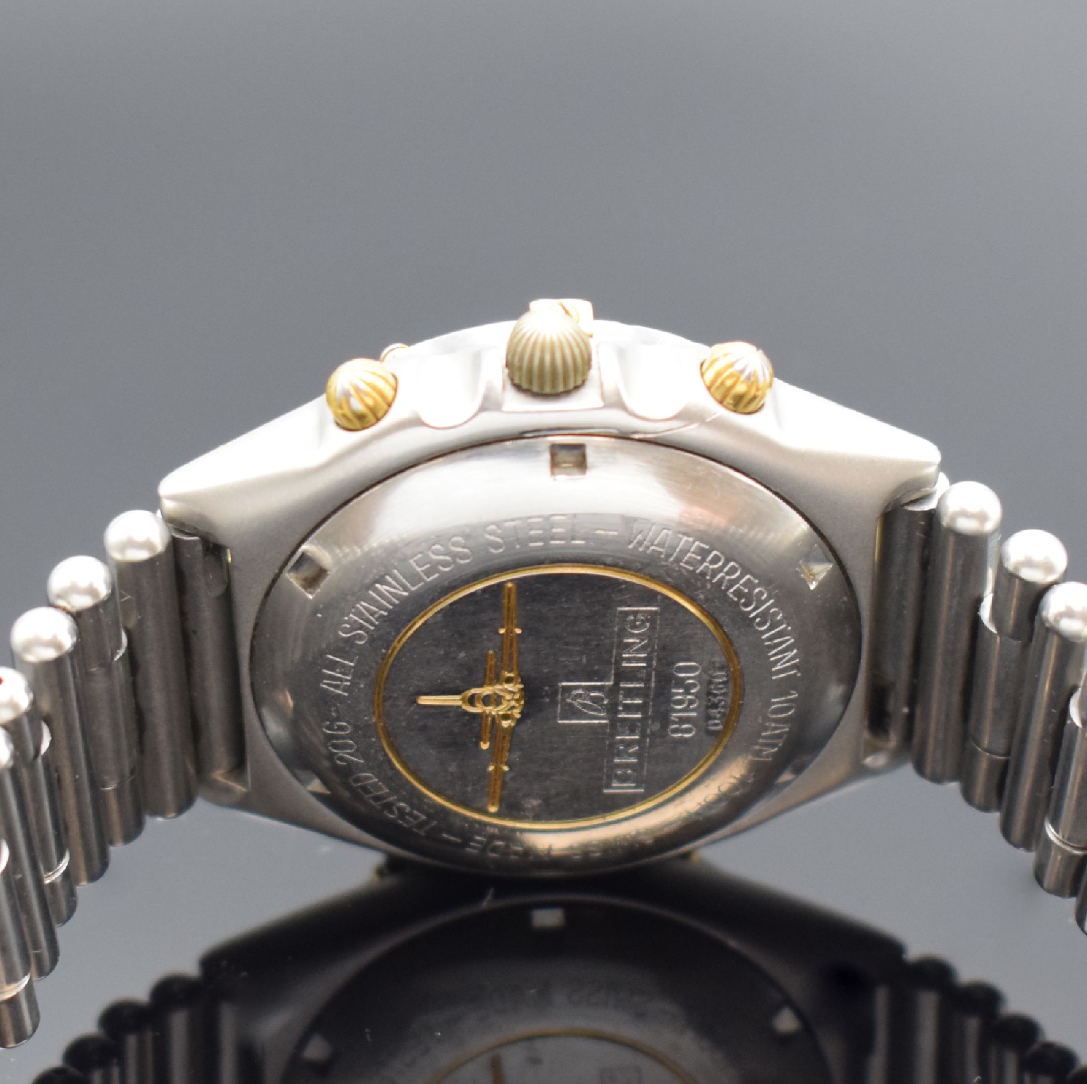 Detail d: BREITLING Herrenarmbanduhr Chronomat Referenz 81950, Schweiz um 1984, Automatik, verschr. Stahlgeh. inkl. orig. Roleauxband m. dopp. Faltschl., eins. ...