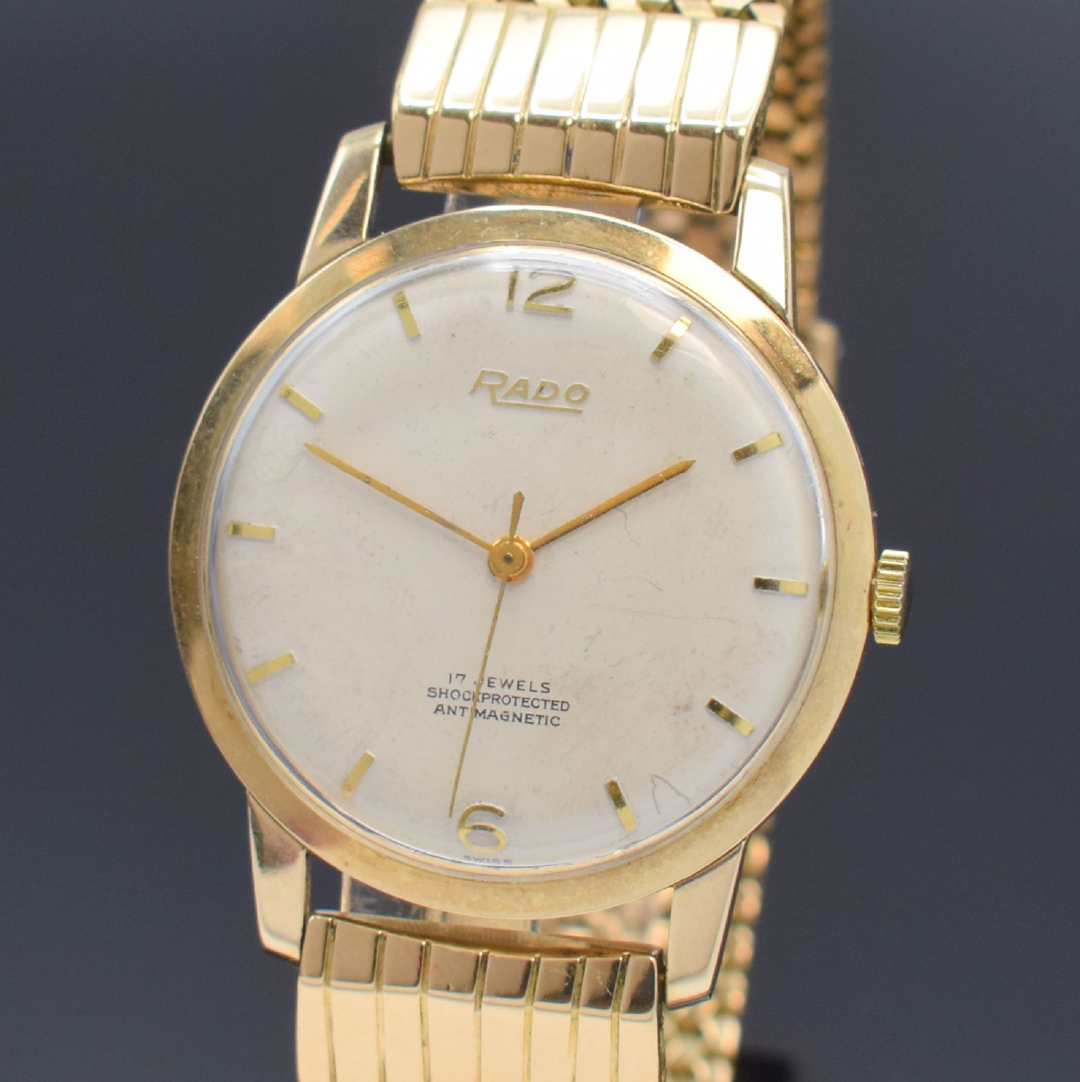 Detail a: RADO Herrenarmbanduhr in RG 585/000 an RG 750/000 Band, Handaufzug, Schweiz um 1960, einschaliges Geh., Glasrand aufgedr., silb. Zifferbl. m. aufgel. ...